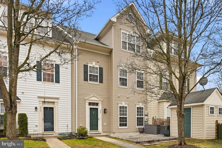 This charming home is located in the desirable River Colony at Piney Orchard community. Upon entering, you're welcomed by tall ceilings and a warm, open entry hallway featuring engineered wood flooring and direct access to the family room, dining area, and kitchen. The dining area boasts a hardwood floor and chandelier, while the sun-filled living room offers oversized windows, a ceiling fan, and an open-concept layout. The kitchen is well-equipped with tall ceilings, honey-colored cabinets, and modern Frigidaire and GE stainless steel appliances, including a 5-burner gas range and a top-freezer refrigerator with an ice maker. Upstairs, the second level includes two bedrooms with engineered wood flooring, green views, and spacious closets with installed closet systems. The main hall bath features a tub/shower combo, a white vanity with a large mirror, and stylish nickel hardware. The laundry/utility room is bright, equipped with a Samsung washer and dryer, a Bradford White 40-gallon water heater, and a Carrier HVAC system. The primary bedroom on the third level offers natural light, green views for privacy, a walk-in closet with an installed system, and an en-suite full bath with double vanity, tons of storage, and classic tile details. Outside, a front patio provides space for outdoor relaxation or entertaining, complemented by a storage shed. Two assigned parking spaces and additional visitor parking are available, with serene nature preserve views from the upper floors, creating a private, tranquil environment. A prime location just minutes from Route 50 and major airports. Surrounded by a variety of shops, restaurants, and recreational amenities, residents will enjoy access to multiple community pools, newly renovated parks, playgrounds, and sports fields nearby.