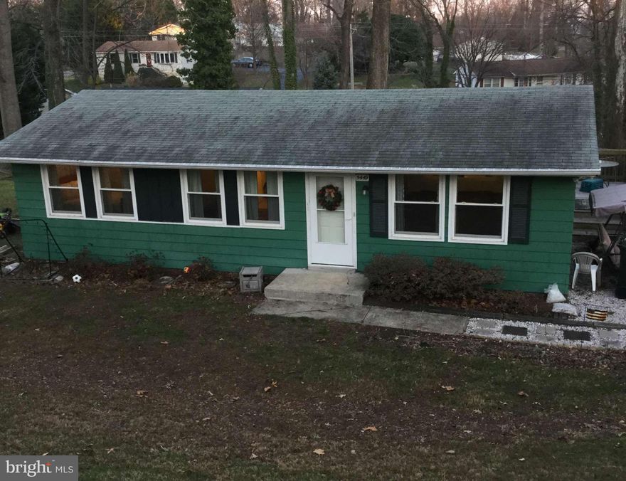 Three bedroom, 1 full bath Rambler with deck and large yard with a shed.  Plenty of parking space. New windows, new nitrogen septic and drain fields, newly tiled bath, laminate wood flooring, ceiling fans, end of street with cul-de-sac. This great home has lots of charm and beautiful beach on the Chesapeake Bay just a short walk away.