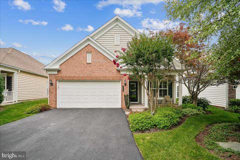 Photo of 44252 Panther Ridge Drive, ASHBURN, VA 20147 (MLS # VALO2130756)