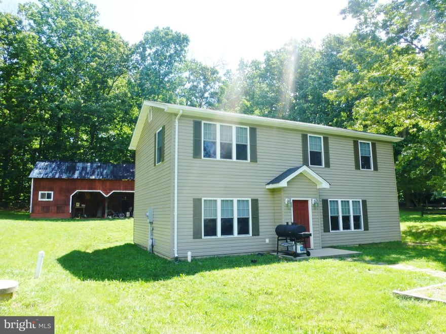 You will love this charming home situated in a beautiful location! Spacious and beautiful kitchen with granite countertops OPEN to the living room, private master suite upstairs with a bathroom that will WOW you, and a fenced level lot just under 1 acre with storage barn! Terrific opportunity to own an upgraded home in a desirable area for under 200k.