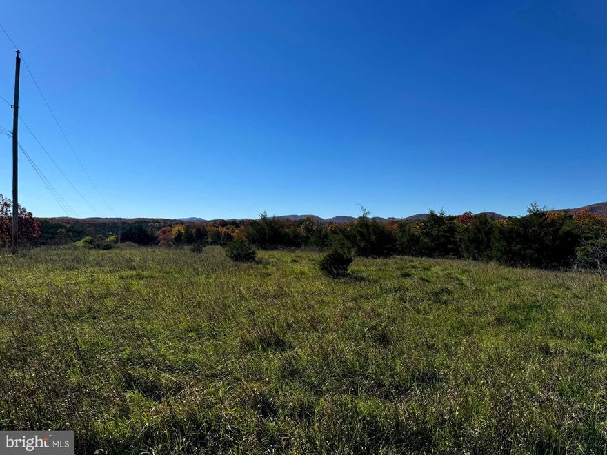 Welcome to a stunning 3.09-acre parcel nestled in the Eastern Panhandle of West Virginia, offering the perfect canvas for your dream home. This property is cleared and 100% usable, providing a flat, build-ready landscape with sweeping mountain views that bring a sense of natural beauty to everyday life. Just 10 minutes from Keyser, WV, you’ll have quick access to shopping, dining, and essential services while enjoying the peace and quiet of rural living. The proximity to Keyser makes this location ideal for those looking for both convenience and a countryside escape. Imagine designing your forever home right here, surrounded by the iconic views and open space that make West Virginia so unique. With its prime location and development-ready land, this property is a rare find. Don’t let this opportunity slip by—reach out today to explore all the possibilities this exceptional parcel has to offer!