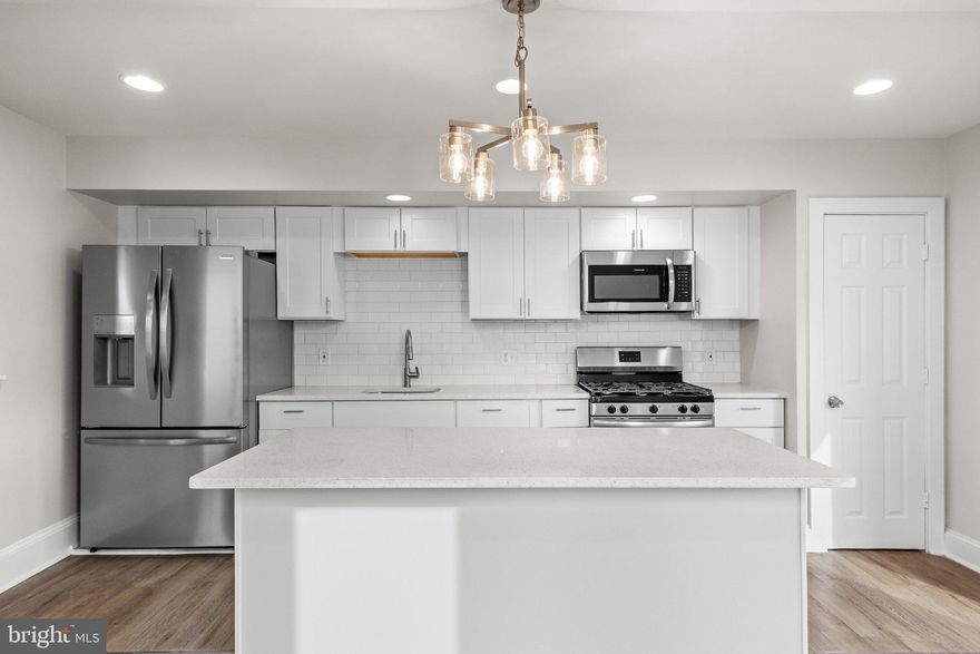 Welcome to 607 Highland Ave, a spacious 5-bedroom, 1.5 bathroom townhouse that offers a blend of historic charm and modern updates. This home has been thoughtfully renovated, showcasing a beautifully updated kitchen and bathrooms.

The heart of the home features a windowed kitchen equipped with stainless steel appliances, a gas stove, quartz counters, an island, and recessed lighting—perfect for cooking and entertaining. The interior flooring is a combination of durable luxury vinyl plank on the first floor, cozy wall-to-wall carpeting on the second and third floors, and stylish ceramic tile in the bathroom, providing both comfort and functionality.

The living spaces flow effortlessly, enhanced by natural light and practical design. The generously sized living room provides space for entertaining or quiet nights at home. The dining room is open to the kitchen while the half wall creates a defined space for dining. For your convenience, there is a washer/dryer hookup, as well as a multiple closets offering ample storage options. Heating is provided by electric baseboard heat, ensuring year-round comfort.

Step outside to your private outdoor oasis, complete with a fenced yard, deck, and additional backyard space. Whether you’re hosting gatherings or simply enjoying some quiet time outdoors, this yard is a standout feature. A mix of private parking and street parking adds versatility and convenience.

Located on the charming Highland Avenue, this property provides the ideal balance of modern living and outdoor enjoyment. Don’t miss the opportunity to make this inviting townhouse your new home. Schedule a showing today!