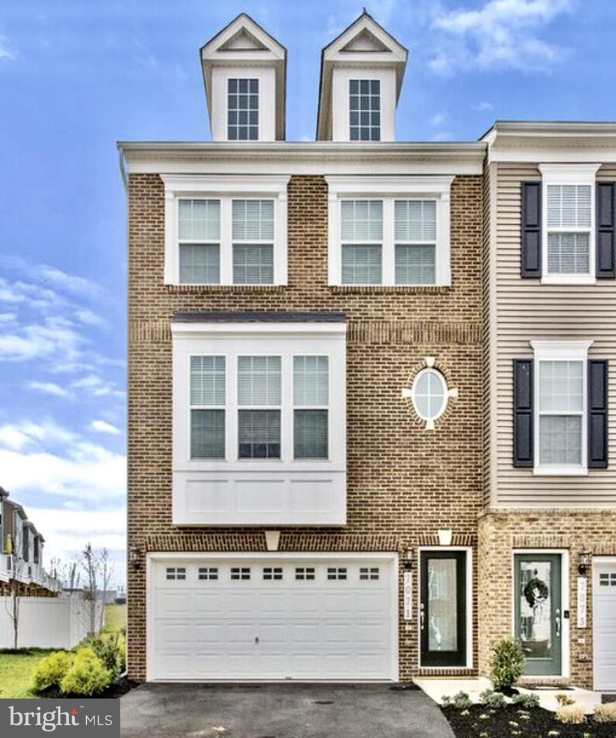 This is the one! Have you been looking for a new construction townhome with all of the upgrades and the timelines do not work? Well, look no further! This stunning Stanley Martin build end unit townhome is in pristine condition. The Lannister model features a front load oversize two car garage with over 2283 finished square feet. The lower level offers tons of natural light, half bathroom, a spacious rec room that walks out to a patio and fenced in yard. As you make your way to the main level, you will notice the gleaming hardwood flooring, 9 ft ceilings, access to the rear deck for entertaining, a gourmet kitchen featuring oversized center island, designer tile back-splash, custom built-in shelves, beautiful white cabinets, stainless appliances and gorgeous granite counters. The spacious upstairs will check your boxes with a large primary bedroom with a walk in closet, a luxurious frameless stall shower, dual vanities with a center tower cabinet piece, two secondary bedrooms with plenty of closet space, a hallway bathroom with a tub/shower combination and a bedroom level laundry room. We really hope you enjoy this rare and well maintained home. **This home is situated in a great location and minutes to shopping, dining, entertainment, route 29 and I-66**