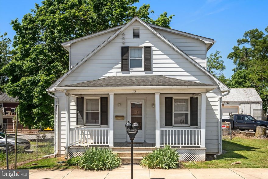 Located in "Historically Hip" downtown Charles Town, this 2 bedroom, 2 full bathroom home is located within minutes to exits for major commuter routes to MD & VA and is walkable to the farmers market and all of the amazing restaurants and shops in town! This could also be an investor opportunity for a potential downtown business. From the inviting front porch, you will walk into an expansive living room on the right and a formal dining room on the left. There is a large eat-in kitchen with vinyl flooring and access to your back deck and the fenced back yard.  The laundry room and a full guest bath are located on this main level of the home. Upstairs are two huge bedrooms and another full bath with a tub/shower combo. The basement is unfinished but can be finished off for more finished living space or can be kept for storage. Come see this affordable downtown home while it lasts!
