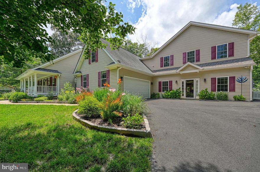 Don't miss out on this incredible water access home on Lake Anna! Have your agent schedule a showing, or feel free to call us directly. This property is situated in the Shorewood Subdivision on the public side of the lake, right at its center, providing easy access to all the restaurants, marinas, and more.

The neighborhood has been recognized as one of the best places to live over the past two years and includes your own deeded boat slip. The house offers ample space for hosting friends and family, with two separate living rooms, a spacious kitchen, and a fantastic bar area equipped with mini fridges and a kegerator.

Recently, the owner added a large extension to the right of the main house. The upper level features two bedrooms, an office space, and a bathroom, while the lower level provides exceptional entertaining space.

The home includes a hot tub, a 22kW Generac whole house generator, a 500-gallon underground propane tank, an 86” large screen TV, a pool table, and bar refrigerators.

The exterior of the home boasts a beautiful outdoor area, complete with a stone-built-in fireplace patio, a hot tub, and extensive landscaping. Don't miss your chance to see this amazing property!