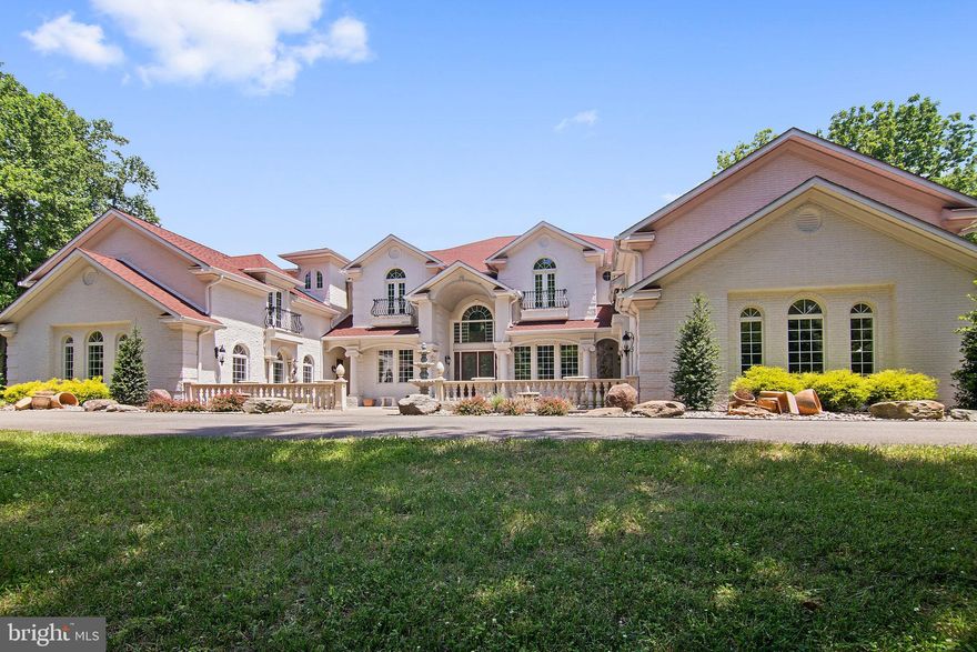 BACK ACTIVE ... PENDING RELEASE...EXQUISITE.. Custom Built Home with over 10,000  sq.ft of living, 5 acres  of land, 6 bedrooms of which include 3 master style  suites each with private baths, 6+ bathrooms,separate in-law suite apartment with full kitchen, washer and dryer. 4 car garage, Media room,Gym, Game Room, Elevator, Ballroom and catering kitchen , wet bar, 2 covered outside verandas & A MUST SEE