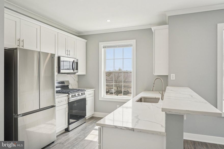 Nestled at 2421 Bristol Road in the heart of Warrington, Pennsylvania, The Warrington Place is a thoughtfully crafted residential community that blends upscale finishes, modern conveniences, and timeless style. Offering one-, two-, and three-bedroom apartment homes, the property is designed to meet the needs of today’s renters who value both form and function in a refined, suburban setting.

Inside each residence, you’ll find open-concept floorplans that maximize natural light and flow, creating a welcoming atmosphere ideal for relaxing or entertaining. The apartments feature soaring nine-foot ceilings and oversized windows, enhancing the sense of space. Gourmet kitchens are outfitted with sleek stainless steel appliances, white shaker-style all-wood cabinetry, quartz countertops, subway tile backsplashes, and oversized islands or breakfast bars in select layouts—perfect for morning coffee or evening meals. Luxury vinyl plank flooring throughout the main living areas adds a stylish, durable touch, while plush carpeting in the bedrooms provides cozy comfort.

Each apartment also includes smart Samsung appliances such as in-unit washers and dryers, allowing residents to handle laundry at their convenience. Spacious bathrooms feature modern vanities, chrome fixtures, and tiled showers or deep soaking tubs. Large walk-in closets provide generous storage, and private balconies or patios in most units offer a quiet space to enjoy the outdoors. Select homes offer premium views or corner locations for even more natural light and privacy.

Beyond the units themselves, The Warrington Place provides a well-maintained environment with controlled access entry, ample private parking, and professional on-site management. The community is located at the intersection of Bristol Road and Route 611, giving residents unbeatable access to major retail destinations and everyday essentials. Whole Foods, Wegmans, Giant, Target, Walmart, Costco, Amazon Fresh, and ShopRite are all within a short drive, making errands quick and easy. Public transportation is also convenient, with a nearby SEPTA bus stop offering a simple commute for those who prefer not to drive.

Warrington itself offers a charming, residential atmosphere with the conveniences of modern suburbia. Residents will enjoy close proximity to a variety of restaurants, local parks, fitness centers, and entertainment venues such as the Regal Cinema. The area is known for its peaceful streets, well-maintained green spaces, and an easy-going pace that makes coming home feel like a true retreat.

The Warrington Place is more than just a place to live—it’s where style meets substance, and convenience meets comfort. Whether you're a busy professional, a downsizer, or someone seeking elevated suburban living, this community delivers a lifestyle that feels both luxurious and effortless.

** Photos are of model units ** Pricing and availability subject to change on a daily basis **