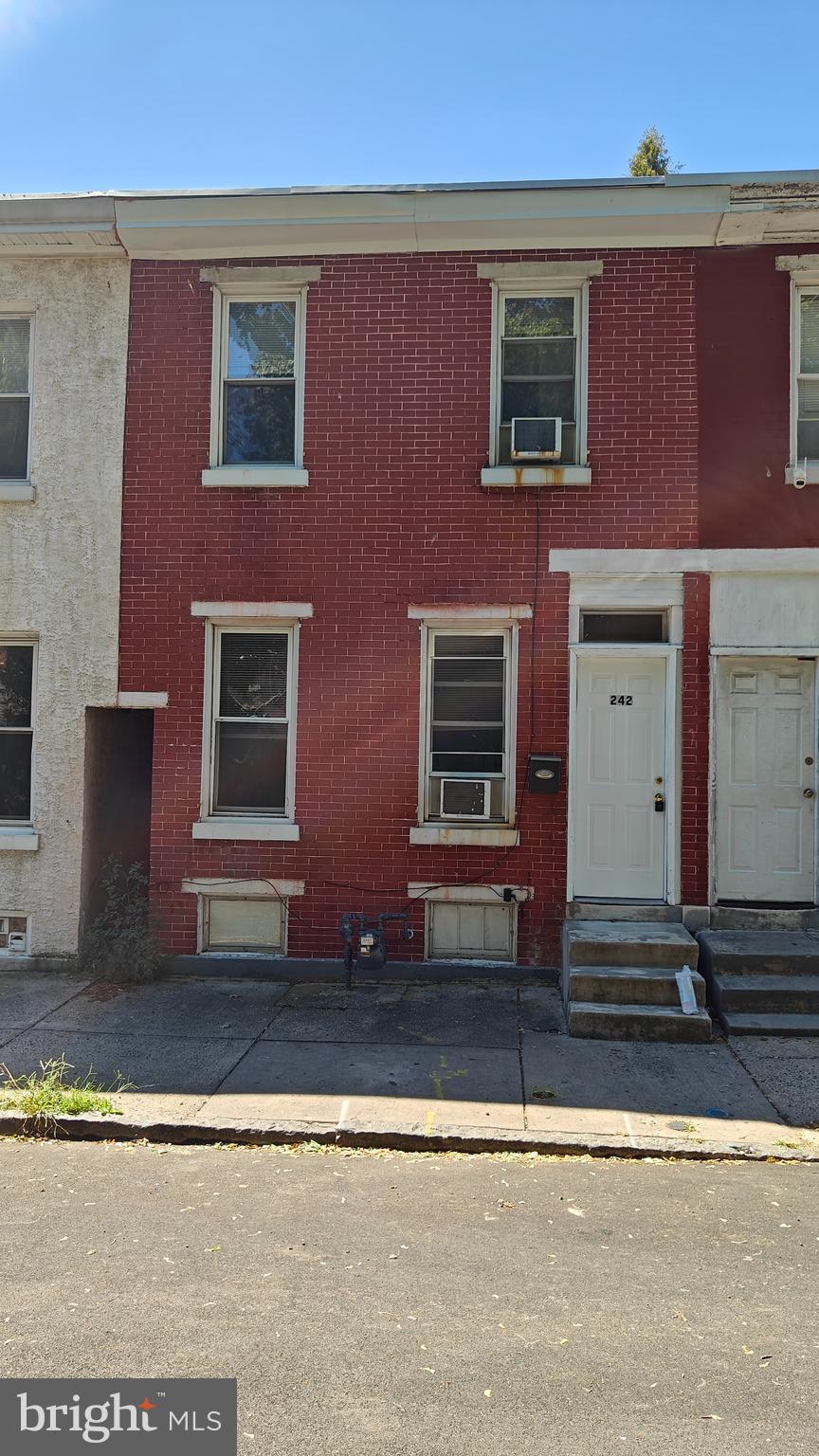 Well maintained row home on a quiet street with private parking.