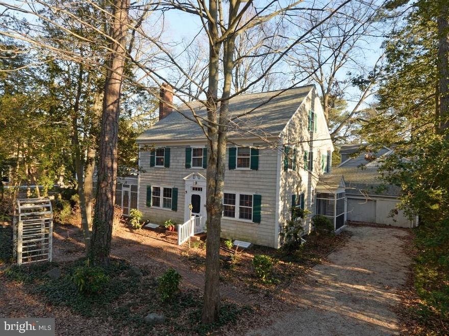 This Spacious Coastal Colonial Style Home Is Situated On A Beautiful Wooded Double Lot (100'x100') Located On The Charming And Sought After Park Avenue. This Classic 4BR, 2.5BA Home Features A Formal Dining Room, Large Living Area Adjoining A Very Spacious Screened Porch, Gorgeous Beams, Hardwood Floors, Beautiful Wood-Burning Fireplace, And An Additional 1BR/1BA Finished Within The Detached Garage. Complete With A Walk-Up Attic, Partial Basement And 1-Car Detached Garage, This Home Boasts Ample Storage Too! Conveniently Within Walking Distance To Rehoboth Avenue, The Beach & Boardwalk!