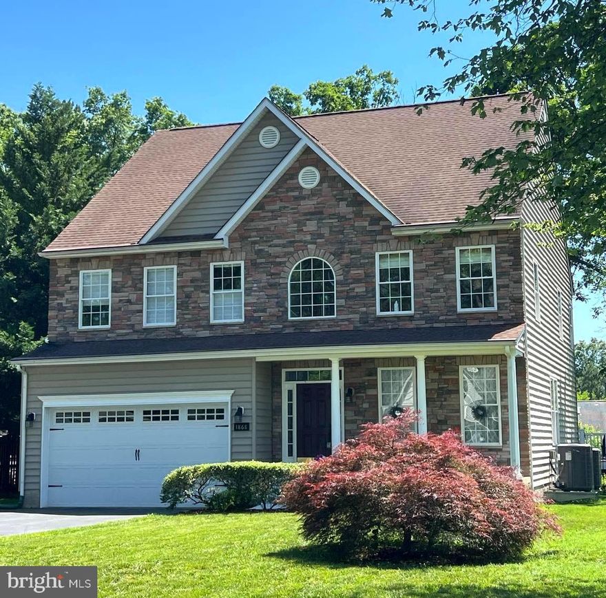 This custom built home offers the perfect opportunity to live just minutes away from the Chesapeake Bay Bridge and Route 50, offering partial water views and a layout designed for both everyday living and effortless entertaining. 

The main level features 12 foot ceilings and oversized 6 foot windows that create bright, open living spaces. A vaulted morning room transitions seamlessly into a sunroom, providing flexible space for dining, relaxing, or working from home. The gourmet eat-in kitchen offers granite countertops, a substantial center island, pantry, and an open-concept design that opens into the family room and sunroom. The primary suite is generously sized, featuring a tray ceiling and a well-designed bath with custom tile shower and double vanity. The remaining four bedrooms share two jack-and-jill style bathrooms offering convenience for family and guests. 

Outdoor living is equally appealing, with an 800-square-foot wraparound deck ideal for entertaining. The property also offers space for a potential in-ground pool (buyer to verify with Planning & Zoning). Additional features include custom hardwood and tile flooring run throughout, tailored Roman blinds and wood shutters, new HVAC system, finished garage, and dedicated laundry room with new washer, dryer, and utility sink. A rare 1,820-square-foot crawl space with 4-foot ceilings, finished concrete floor, and indoor access provides plenty of additional storage. 

Built by local builder Lacrosse Homes with numerous upgrades, this well-maintained home offers immediate value in one of the most popular areas on the Eastern Shore - all with no HOA. Schedule your tour today.