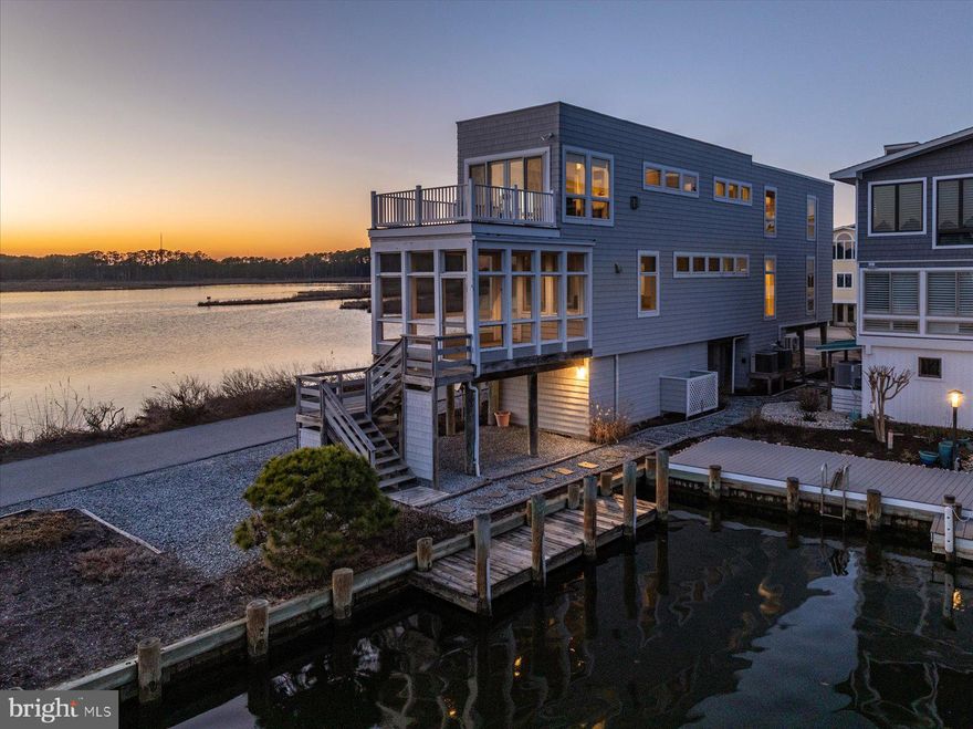 Life on the water doesn't get much better than this! Perfectly situated with the canal on the east side and Jefferson Creek on the west, enjoy spectacular water views from every room in the house! This 3- story home was designed specifically to capture the water and wildlife views and it does not disappoint. The main living space on the 2nd floor offers a wall of windows to take in your surroundings and enjoy the incredible sunsets while lounging on the couch or cooking dinner. Step out on the 2nd floor deck or enjoy a nice meal on the screened porch with views from every seat! This home is designed for friends and family to have their own private space, as each bedroom offers beautiful water views and a full bathroom either attached or just outside the door. The 3rd floor primary suite is a showstopper. Complete with a 2-sided fireplace, sitting area, walk-in closet and private deck, you'll never want to leave your bedroom! Down the hall is another bedroom with an attached office that leads out to another deck so no one has to share their outdoor space. Walk outside, jump on your boat docked right at your back door, and you will be in the Assawoman Bay in just minutes! Enjoy crabbing, fishing, kayaking, paddle boarding or hopping around to the local restaurants on the water. Want to go to the beach? Use your parking permit to park oceanside and enjoy the quiet, guarded beaches in South Bethany. After a day in the sun, rinse off in the outdoor shower before heading inside for sunset. A large, insulated storage shed with electric provides the perfect place to store bikes, kayaks and all of your beach gear. This home has been loved by one family since it was built and now it's ready for the next one to create their own memories at the beach!