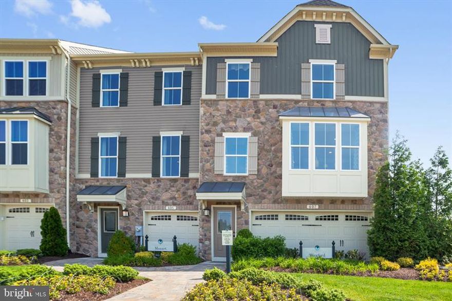 Ryan Homes is taking precautionary measures to insure the safety of our valued customers and employees.  Our model homes are open, but we are meeting 1 on 1.    Quick Move In -  Wexford  at Shaw's Discovery.  An End of Group 3 bedroom, 2 full, 2 half bath luxury townhome with 2 car garage, 4 foot Extension, Finished Rec Room with Powder room, Composite Deck, Hard Surface flooring throughout the main level, Quartz counter tops and Stainless Steel Appliances.  ALL Appliances Included. A tranquil private community surrounded by beautiful forest conservation, with a community fishing pier and walking trails. Photo images are representative.