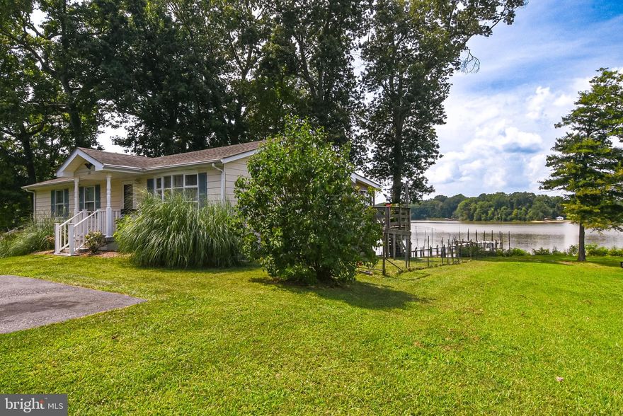 NEW PRICE and SPECIAL OFFER: With a ratified contract by BLACK FRIDAY, November 24, 2023, Seller will include a $5,000 settlement credit and a one-year AHS-Shield Plus home warranty.  ROSIER CREEK WATERFRONT: Nestled on the banks of Rosier Creek in historic Westmoreland County, this 3 Bedroom, 2 Bath home with walk-out basement is perfect for full-time living or as a vacation getaway.  Enjoy the beautiful sunsets and creek breezes on the covered deck--and the short walk down to the private dock with 10,000 lb boat lift and shoreline launch area for canoes and kayaks.  With easy access from the protected creek waters to the wide Potomac River, this home on .55 acres has approximately 70' of waterfront and is ideal for boating enthusiasts and water recreation. The walk-out basement is partially finished with a kitchenette and bathroom, and the covered patio area can host crab feasts, barbeques and family gatherings.   Less than 90 minutes from the DC metro area and an easy commute to Dahlgren, southern Maryland or Fredericksburg.  And just a short drive to the charming riverfront town of Colonial Beach with restaurants, shopping and amenities.