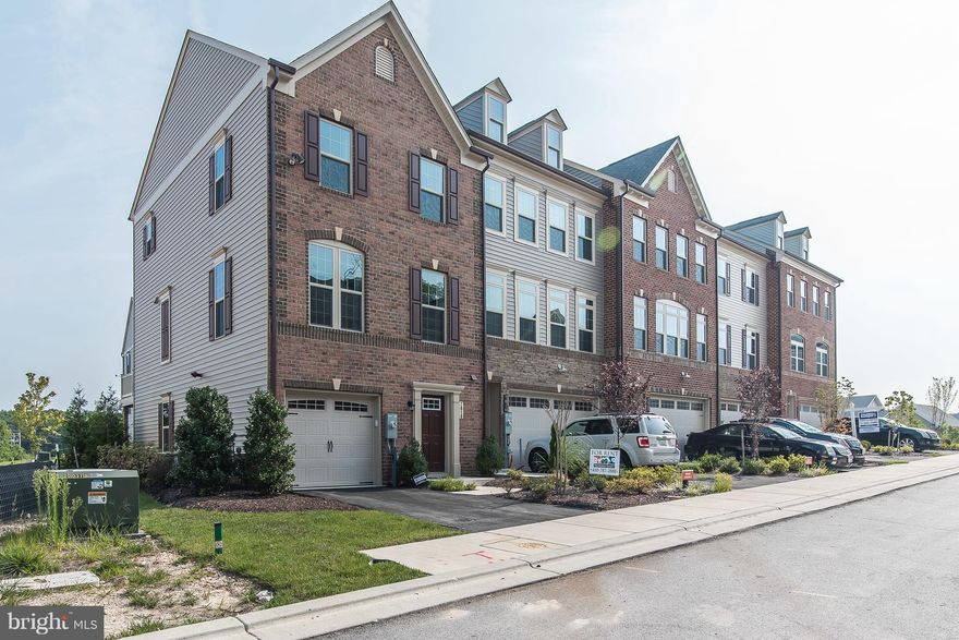 Former model home now available for lease. This end unit home is loaded with upgrades and d cor.  Hardwood entry and main level flooring. First floor family room, open main level with center island breakfast bar and dining area leading to large deck, master suite with tray ceiling, walk-in, full bath w/dual head shower, BR level laundry. Gorgeous! One block to pool/clubhouse.