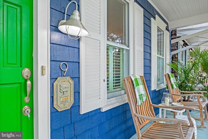 Colonial charm meets modern sophistication at 9 Dean Street in the Historic District of Annapolis, MD . This meticulously restored home, featuring an inviting front porch, boasts classic architecture with a modern flare. 
Walk inside, where the space is a harmonious blend of historical character and contemporary comfort.
The main level features hardwood and  brick floors throughout,  anchored by a cozy, gas brick fireplace, perfect for intimate gatherings. The completely updated kitchen features a marble eat-in island, high-end appliances, custom cabinetry, and marble countertops, making it ideal for both everyday meals and entertaining.
The second floor features a spacious primary suite and additional bedroom both with ample natural light, and  luxurious en-suite bathrooms. The third floor features an additional bedroom, work space and full bath. 
The home also includes an updated private brick-paved patio and garden, offering a peaceful outdoor space for relaxation or alfresco dining. Dean Street is a one way street and easy to park on. Bonus! A city Parking Lot is adjacent to the rear yard and can be accessed by the rear gate for large gatherings. With its prime location, 9 Dean Street is just steps away from the vibrant shops, restaurants, and waterfront of downtown Annapolis, providing a perfect blend of historic charm and modern convenience.