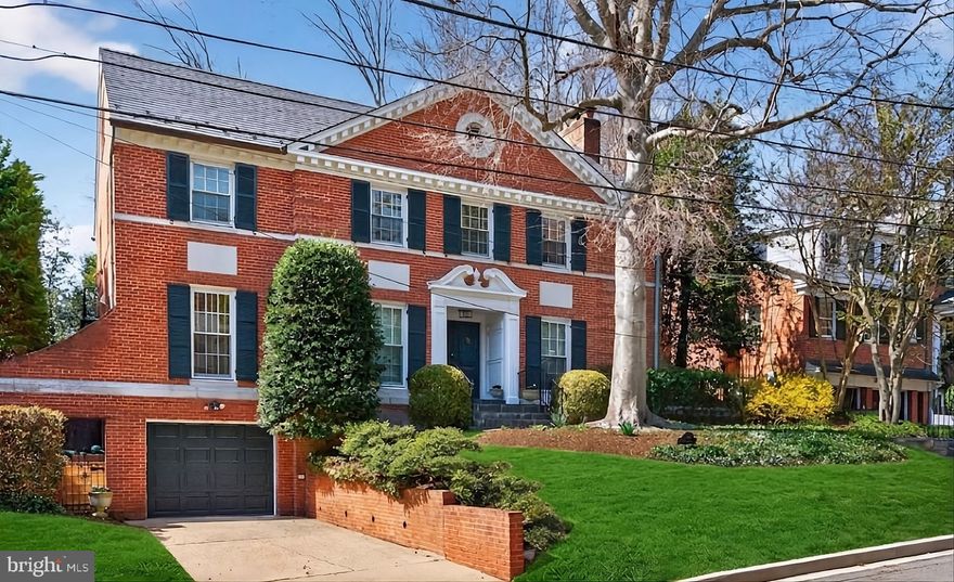 Located at the end of a quiet cul-de-sac, this classic center hall colonial offers timeless elegance and modern comfort. Featuring five bedrooms, the home welcomes you with a gracious foyer, flanked by a formal living room with fireplace, a formal dining room with wainscoting and crown molding, and den/library with built-in shelving. The updated kitchen boasts granite countertops, stainless steel appliances, and a center island, opening to a breakfast nook overlooking the private backyard. 
Upstairs, the spacious primary suite includes a walk-in closet and ensuite bath with soaking tub and separate shower. The additional 4 bedrooms on the upper 2 floors offer flexibility for guests, home offices, or creative use. The lower level offers a recreation room with wood burning fireplace, an au-pair or in-law suite, and access to the extra large garage.
Enjoy peaceful living with close proximity to the Palisades Farmers Market, MacArthur Boulevard shops, dining, and neighborhood amenities - the perfect blend of tranquility and convenience in this gracious home.