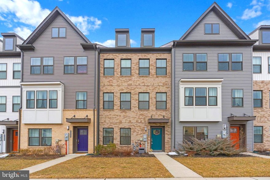 Welcome to this beautifully maintained four-level home offering 3 bedrooms, 2 full baths, and 3 half baths — with at least one bathroom on every level for ultimate convenience. Built in 2021 and showing like new, this home blends modern style, thoughtful design, and an exceptional lifestyle community.

The entry level features a flexible space ideal for a playroom, home office, or additional living area, along with a convenient half bath and access to the rear-entry two-car garage.

The main living level is the heart of the home, showcasing a spacious, light-filled kitchen with abundant cabinetry and prep space that flows seamlessly into the dining area and expansive living room. Sliding glass doors lead to a beautiful deck — perfect for entertaining or relaxing outdoors. A half bath on this level adds everyday practicality.

Upstairs, you’ll find three generously sized bedrooms, a full hall bath, and the convenience of bedroom-level laundry. The primary suite offers a private retreat complete with a large en-suite bath and ample closet space.

The top level features a bright loft with its own half bath and a beautiful glass door that opens to a private deck overlooking the community — an ideal space for a potential fourth bedroom, office, media room, or peaceful escape.

Beyond the home, the community amenities are truly exceptional. Residents enjoy a resort-style inground pool, an impressive 5,000-square-foot clubhouse with coffee bar, lounge, and patio dining, as well as a marina, boat ramp, dock, beach, playground, trails, dog park, and fitness center — offering a vacation-inspired lifestyle year-round.

Ideally located with easy access to major commuting routes and just minutes from Fort Meade, NASA Headquarters, and National Business Park, this nearly new home delivers space, style, and convenience in one incredible package.  Call TODAY to schedule your showing of this Beautiful Home Sweet Home!
