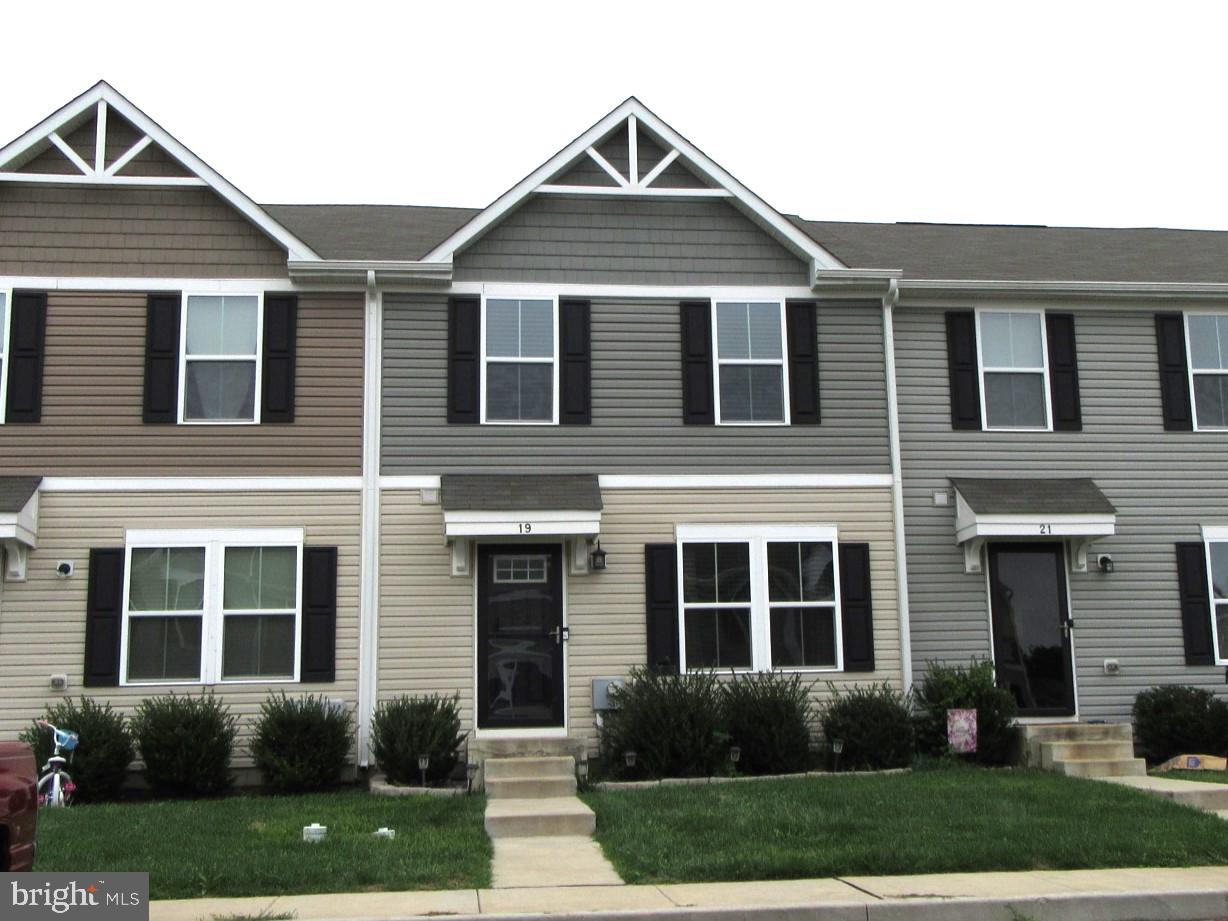3BR/2.5BA town home with finished basement. 4 years old with open floor layout. Kitchen with stainless appliances, center island, and built-in microwave . Adjoining Dining room with slider to back yard. Luxury Vinyl Plank (LVP) flooring in the Kitchen, Dining Area, and in the Family Room on the finished lower level. Formal Living Room with ceiling fan. Main Bedroom with private Bath and Walk-in Closet. The two other bedrooms are good sized and share a Hall Bath. Upper level Laundry is super convenient (washer & dryer included). Plenty of recessed lights throughout . The beautifully finished Family Room on the lower level features a built-in Bar area. A large escape window makes it safe and brings in a lot of natural light. An unfinished area provides extra storage space. High efficiency gas furnace and central AC. Energy efficient never ending supply of hot water provided by the on demand gas hot water heater. 2 deeded /reserved parking spaces in front of the home. 1,570 sqft of finished living space. Owner pays the monthly HOA fee which includes grass cutting and trash/recycling. The application process includes credit, background, income/assets, and reference checks. For more information on the rental requirements and to set up a showing please TEXT or EMAIL Mark - no phone calls please. Available NOW!
