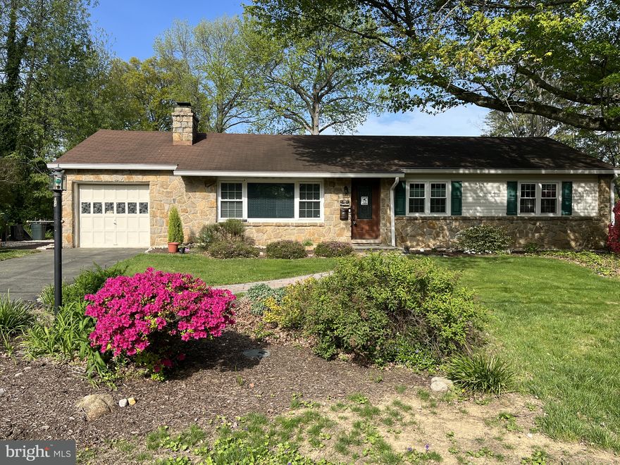 This three-bedroom, two-bathroom rancher in the charming North Wilmington neighborhood of Windybush has been carefully updated and maintained.  The inviting living room has a cozy fireplace, stone hearth, and a large picture window for plenty of natural light. The formal dining room transitions smoothly into the updated kitchen with warm-toned cabinetry, granite countertops, a tile backsplash, stainless steel appliances, and a wine refrigerator. The family room has a vaulted ceiling, wood beams, a large bay window, and sliding glass doors that open up to the rear patio.  The bedroom wing of the home includes a primary bedroom with an updated en-suite bath and tiled shower, two additional bedrooms with generous closet space and an updated hall bathroom with a tub/shower. There is hardwood flooring throughout the home, recessed lighting, crown molding, and ceiling fans. The HVAC and water heater were replaced in 2022, and the windows and doors were replaced in 2017. The backyard has a retractable awning over the patio, which overlooks a peaceful, maturely landscaped yard. The Windybush neighborhood has a community pool. It is close to nearby parks, restaurants, and shopping, with easy access to I-95. Book your tour today!