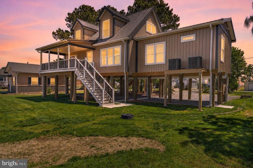 Your own paradise is waiting for you here in a hidden beach on the Delaware Bay!
Kitts Hummock Beach is a quiet and peaceful Bay community with Picturesque and Captivating scenic views of Wetlands, Conservation Areas and Nature trails. Close to Dover for shopping and conveniences.
 Delaware’s Ocean beaches a hour+ away.
This Amish built custom home is quality construction. When you walk in the Beautiful Hardwood floors are throughout. Neutral color palette. Lots of Natural lighting. Cozy living room.  Great Kitchen with Breakfast Bar. Stainless Steel Appliances,  Gas range, microwave, dishwasher and refrigerator with ice maker.
First level has a main bedroom with full bathroom. Laundry room.  Powder room.
2nd level has 2 bedrooms  that over looks  the wetlands.   1 full bath.
Ceiling fans , central air,
 Energy star heating system ( propane) and
 Tankless hot water system.
Pre wired for a cargo lift/ elevator.
Note: 51 N Bay lot with Garage next to this property is not included but is an option to purchase.