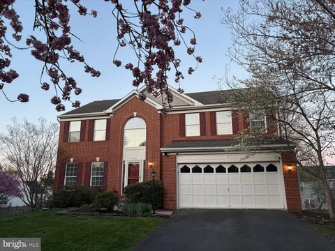 Photo of 43104 Stonecottage Place, ASHBURN, VA 20147 (MLS # VALO2120276)