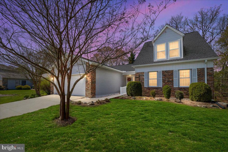 Find more to love in this beautifully updated home, located in the sought-after 55+ community of Heritage Harbour, which blends everyday comfort with standout upgrades and access to premier amenities. Entertain outdoors no matter the weather with the large screened porch, ideal for al fresco dining and endless relaxation. Inside, the remodeled kitchen is the heart of the home and features upgraded countertops, new cabinets with oil-rubbed bronze hardware, a central island with even more cabinet space & stool seating, and spacious pantries.  Recessed lighting and hardwood floors add warmth and style to the kitchen and dining areas, while updated light fixtures brighten every room. Hardwood flooring continues into the ground-floor primary suite with its walk-in closet and private bath. Upstairs, two oversized bedrooms offer generous closet space and share a large bathroom. The huge lower level includes an expansive rec room with dual walk-outs, additional storage, and unfinished space ready for your design inspiration. Other done-for-you highlights include a double-bay garage, newer heating and cooling systems (2018), a newer roof (2021), water heater (2021), washer/dryer (2019), GE oven & microwave, Bosch dishwasher, and Kohler sink, all offering added peace of mind. Living in Heritage Harbour provides access to indoor and outdoor pools, tennis and pickleball courts, bocce and horseshoe courts, a 9-hole golf course with clubhouse and pro shop, a fitness center, walking trails, private South River access with a pier, and more than 90 social clubs and activities, including a woodworking shop. Minutes from downtown Annapolis, the Naval Academy, and commuter routes to Baltimore, DC and the Eastern Shore, this pet-friendly community offers low-maintenance living with high-quality perks, including group trips to local shopping and cultural sites plus volunteer drivers for medical visits. One-time community fee of $2,000 for new residents due at settlement.