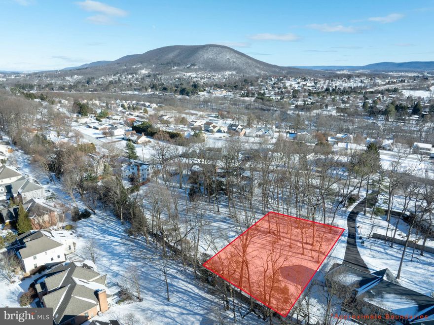 One of a kind beautiful, wooded building lot located in the established Centre Hills Village and State College School District. Public water and sewer available. Recorded shared access and utility access.