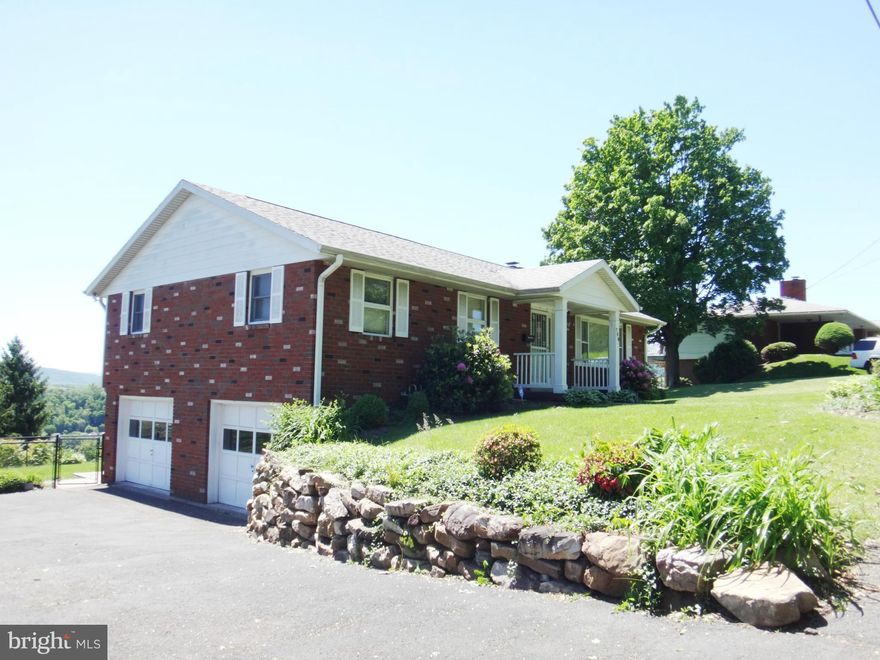 This 3 bedroom rancher offers breathtaking views of Cumberland. Watch the July 4th Fireworks right from the comforts of the upper deck just off the dining room. The 23 x 20 lower level family room and rear patio offer great entertainment possibilities. Ample off-street parking in driveway and 2-car built in garage. New HVAC 2015.