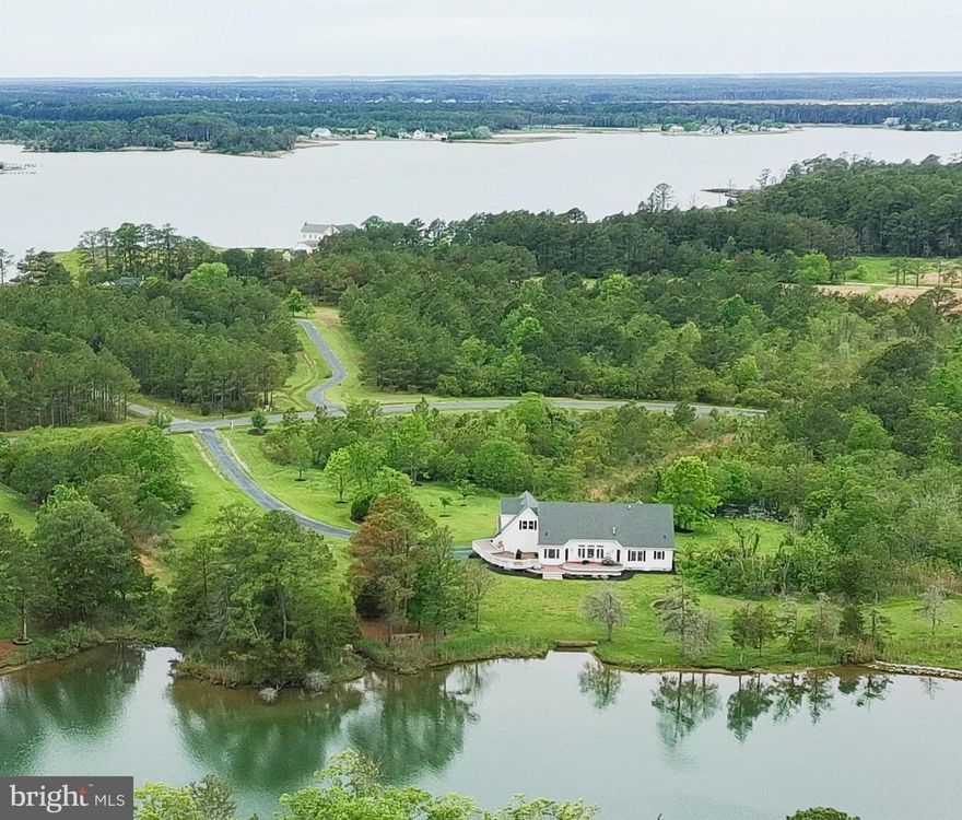 Enjoy peaceful waterfront living in this beautiful Cape Cod set on 5.5+/- acres along protected Webbs Creek/Fishing Creek, just minutes from the Choptank River. Designed for comfortable one-level living, the home offers 3 bedrooms, 2 baths, a private home office, dining room, and a spacious great room with vaulted ceilings and a corner stone gas fireplace. Expansive windows and doors open to an impressive  1,000 +/- sq. ft. waterside deck, perfect for entertaining or simply taking in the tranquil views. Horses are permitted on the property, adding flexibility and rural charm.
The waterside primary suite features a tray ceiling, direct deck access, and beautiful water views. The en-suite bath includes a jetted soaking tub, double vanity, separate glass shower, and an oversized walk-in closet. The custom kitchen is well equipped for cooking and gathering with stainless steel appliances, a large pantry, ample prep space, and freshly painted cabinetry, complemented by detailed molding throughout the home.
Recent improvements include an encapsulated crawl space, high-efficiency heat pump, and Rinnai tankless water heater.
Outdoor living is a highlight—relax on the large deck with morning coffee or evening sunsets while enjoying frequent wildlife sightings including blue herons, eagles, and deer. The oversized two-car garage provides additional space for storage or water toys. A deep-water community dock (approx. 6' MLW) is located at the end of the street, and a private pier is permitted.
The unfinished second level (1,500 sq. ft. +/-) offers excellent potential for additional living space or storage and already includes a bathroom rough-in. This exceptional property combines privacy, nature, and waterfront lifestyle—where every day feels like a vacation.