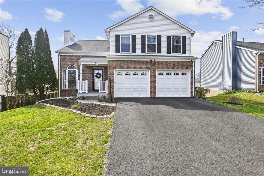 Welcome Home to this beautiful TWO CAR GARAGE Colonial that been meticulously maintained! Featuring FOUR  bedrooms and 3.5 bathroom - PLUS space for a FIFTH  bedroom upstairs (see realtor notes for contractors estimate of $3,600!).  You will love the curb appeal and the covered porch as you enter the home . The wide open floor plan of the main level is great - featuring hardwood floors and a spacious  updated kitchen with huge kitchen island, stainless steel appliances, granite counters, and a large pantry! The fireplace in the spacious kitchen make this home feel so welcoming and warm! Also right off the kitchen is a deck perfect for grilling with stairs to the large backyard! Upstairs is a large landing (also hardwood) which can be easily converted into a bedroom. The large primary bedroom boasts two closets, ceiling fan, recessed lights, and an updated primary bathroom with custom tile work in the huge walk-in shower as well as around the garden tub.  In the fully finished lower level - a sunny walkout sliding glass door for tons of natural light!  It also has a waterproof laminate flooring (2021), a large recreation room, an updated full bathroom, and the fourth bedroom.  Walk out from the basement onto the patio for a cookout under the pergola. The back yard is lovely - fully fenced and ready for entertaining or fun on the play set!  Extra storage in the shed ready!  Driveway (2021) Roof (2015), Windows (2014),  Front porch and door (2019). Newer HVAC (2015).  NO HOA! Come see us!