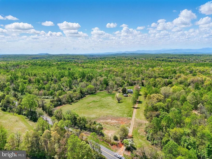 Incredible opportunity! Large 113+/- acre tract of land in Culpeper, with road frontage.  Current zoning allows for a by right immediate creation of 3 lots.  Ideal candidate for a rezone to RR! Multiple ponds/stream.  Additional 8.2 ac parcel available. Home sold in as-is condition - value is in the land.
Please - no pulling in the driveway without a scheduled showing appt.  Home is occupied.