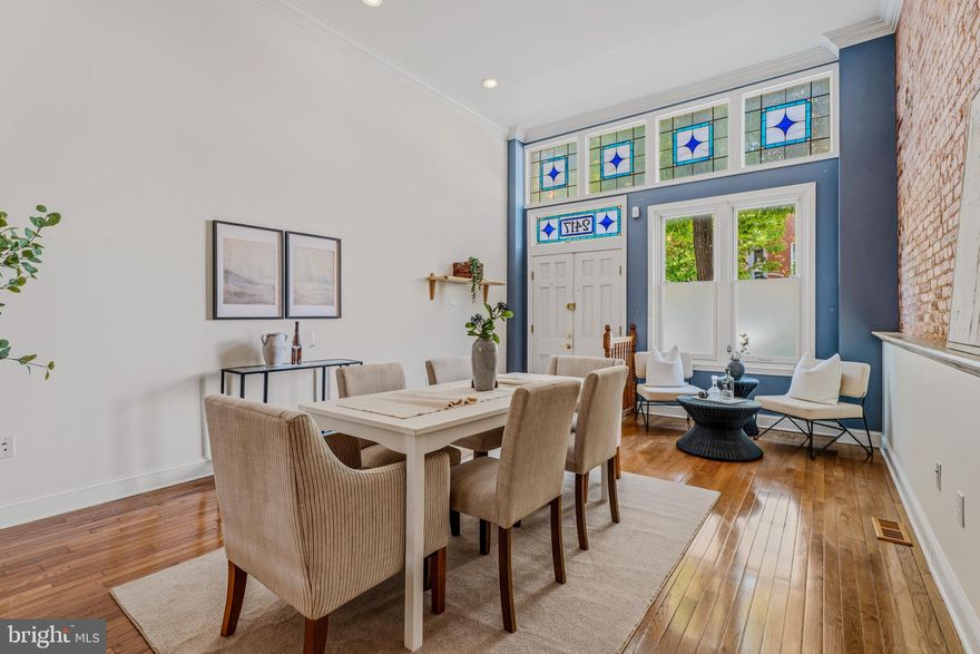 ABSOLUTELY STUNNING RARELY AVAILABLE-fully renovated turn-of-the-century townhouse in the heart of Baltimore’s Station Arts District — over 2,300 sq ft across three light-filled floors. This 3-bedroom, 3.5-bath showpiece blends original charm and upscale finishes: soaring ceilings, expansive exposed brick, crown molding, recessed lighting, beautiful hardwoods, and dramatic stained-glass at the main entrance. 

The open main level is ideal for entertaining with generous living, dining, and family spaces, one working gas fireplace with brick mantel and handmade tile, and a powder room. The chef’s kitchen features granite, stainless appliances, double ovens, a standalone gas cooktop, and abundant workspace. 

Second floor offers two bedrooms (one a second master with ensuite and private balcony, one with unique arched windows), plus a convenient laundry room with updated washer/dryer. The entire top floor is an exquisite primary suite with three skylights, Swarovski crystal chandelier, Jacuzzi soaking tub, two walk-in closets, and a bonus den/office area. 

Comfort and convenience: two-zone HVAC, newer windows including Pella. Basement area with extra space for storage. Back fenced garden can easily be converted back to accommodate off-street parking; additional free parking is a half-block away. 


Outdoor amenities include two porches, extended yard, back garden with three raised beds and two apple trees . Prime, walkable location — minutes to Penn Station (easy DC commute), Johns Hopkins, Baltimore Museum of Art, and dozens of top restaurants just a few blocks away (Clavel, W.C. Harlan, Dutch Courage, Mama Koko’s, Faddensonnen). Luxury rehab projects nearby and Charm City Circulator access on St. Paul St. This home hasn’t been on the market in nearly a decade — meticulously maintained and truly one-of-a-kind. Schedule your showing today.