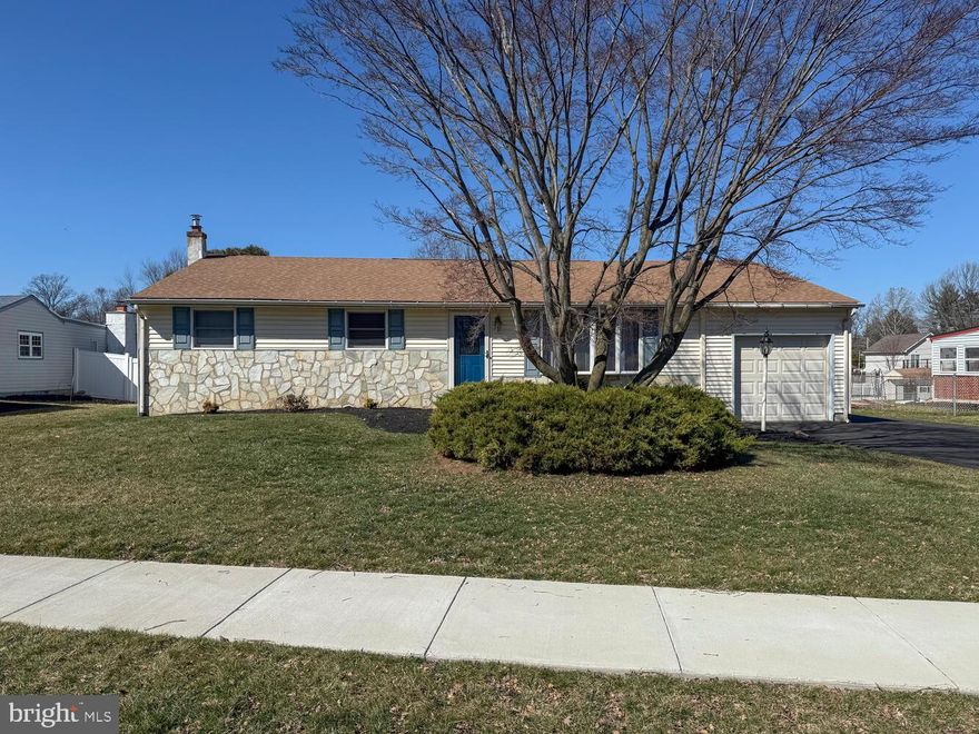 Comfortable single-level living meets flexible space and everyday convenience in the established Sweetwater Farms neighborhood. Set on a generous .37-acre lot, this beautifully maintained ranch offers inviting living spaces and a desirable Bucks County location.
Soft neutral tones create a warm and welcoming atmosphere throughout. The main living room flows into the spacious kitchen featuring abundant cabinetry, ample counter space, and an island with bar seating—perfect for casual dining and entertaining. Just beyond, a dining area provides space for a full table and opens naturally to the inviting family room highlighted by a striking brick pellet stove, creating a warm and comfortable gathering space for everyday living.
An additional sun-filled living area offers exceptional versatility and can easily serve as a formal dining room, home office, playroom, or secondary lounge depending on your needs.
The thoughtfully designed layout includes three well-sized bedrooms with generous closet space. The primary suite offers a private bath, while the hall bathroom has been tastefully updated.
The finished lower level expands the living space with an entertainment area complete with a built-in bar, oversized walk-in storage closets, and a sound-insulated room ideal for music, hobbies, or creative pursuits.
Outdoor living is equally inviting with a large maintenance-free deck overlooking the private, fully fenced backyard—perfect for relaxing, entertaining, or enjoying the changing seasons.
Located within the Neshaminy School District and just minutes from parks, shopping, dining, and local breweries. Convenient access to Street Road, I-95, and the Pennsylvania Turnpike provides easy travel to Philadelphia, New Jersey, and New York.
A wonderful opportunity to enjoy comfortable one-level living in an established neighborhood with space, flexibility, and convenience.