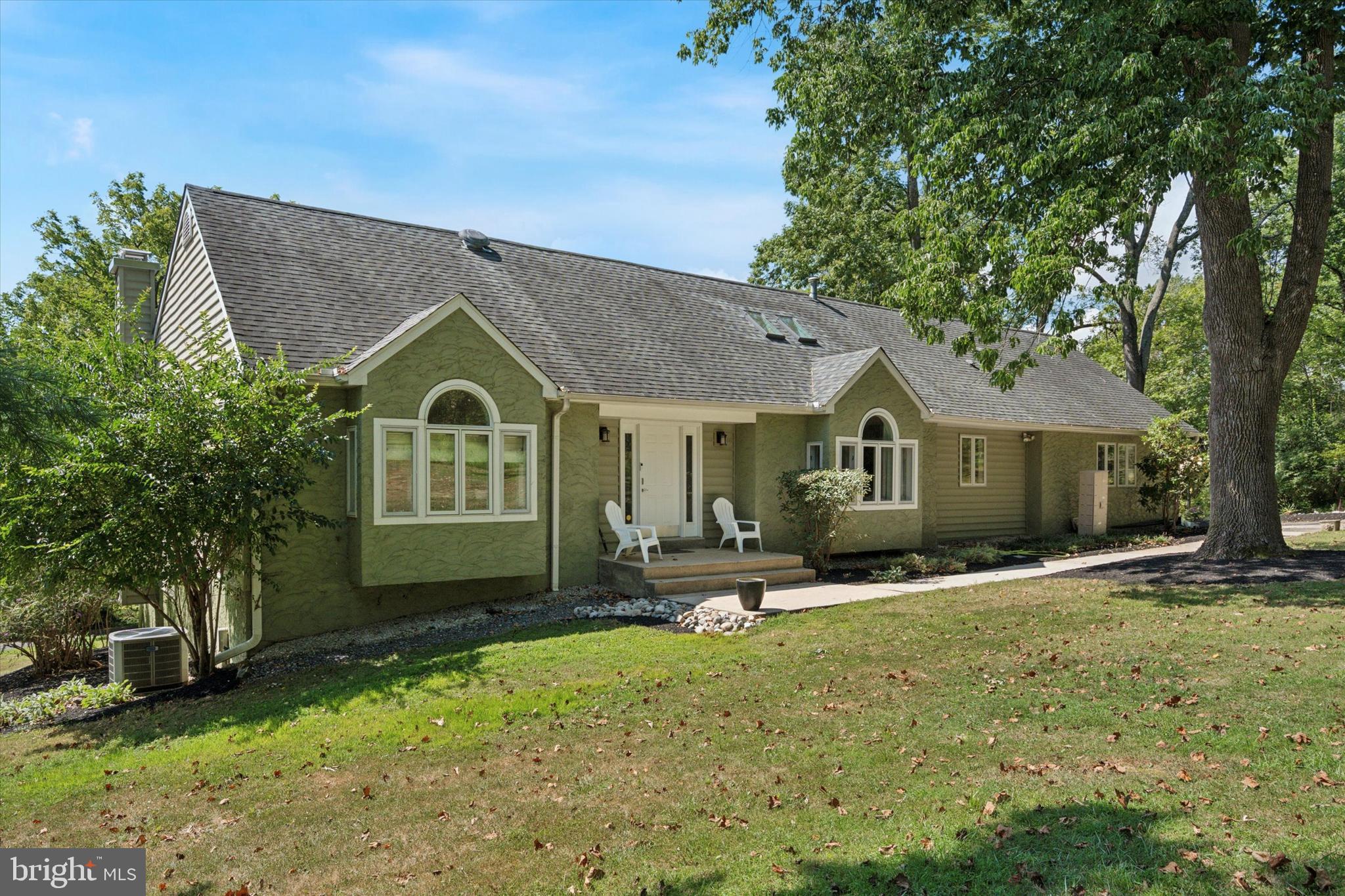 This is the Middletown gem you've been looking for! A Contemporary Rancher custom built by the original owners which is now available for its next owner. Situated on over an acre lot this home sits way off Painter Road with a wooded view of your front yard. Enter a stunning and welcoming foyer which features a step down to sun drenched living room with fireplace, formal dining room, and updated gourmet kitchen. Each room is surrounded by the wrap around deck with easy access. On the main level you will find a Primary Bedroom with updated full bath, access above to a loft area, and two large walk in closets, a second bedroom with a hall bath, laundry room, and access to 2 car garage. The second level features a private third bedroom. There is a full basement as well. This home has been well maintained and "gently lived in" since it was built. It features soaring cathedral ceilings, skylights in the formal dining room and primary bedroom for maximum sunlight exposure, updated gourmet kitchen less than 2 years old, updated primary bath, refinished hardwoods and decking, freshly painted, professionally landscaped, newer mechanicals, newer roof, and some replacement windows. Whether you are down sizing to a ranch or still need space to grow this home is for you. It is over 3,400 sq ft on a large private 1+ acre lot. Enjoy the wooded view in private, entertain on the large open wrap around deck with a great view, or cozy up to the fireplace in the winter. Public sewer tie may be available but Buyer/Agent must perform due diligence to verify. Serviced by the Rose Tree Media School District. The high school is near by as is Tyler Arboretum, Wawa Train station, Granite Prominade, Riddle Hospital, Medical facilities, shopping, and restaurants as well. It is not far from down town Media Borough "Everyone's Hometown" too. Easy access to major travel routes makes this a very desirable location as well. This truly is a must see home. Make your appointment today and be ready to welcome the fall season and holidays that are right around the corner in your new home!
