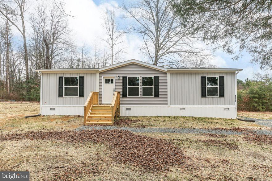 HOT LISTING ALERT!! BRAND NEW CONSTRUCTION of this pre fab home on a permanent foundation!!! Take advantage  of the opportunity to grab this home before it is to late, the construction has just finished and is now yours for the taking. This open floor plan with a modern farmhouse twist includes 3 bedrooms, 2 bathrooms and 1200 sq ft with tons of upgrades including 2 tone cabinetry, gorgeous bathrooms,  a large kitchen island with overhang for stools, a butlers pantry in the utility area, tons of counter top space, stainless steel appliances. I can go on and on ... there is LVP flooring throughout the enitire home, a slidding glass door to your rear deck that leads to the backyard. Speaking of the backyard... the lot is .75 of an acre located in the heart of King George and walking distance to the County offices and local shops!!  The well and septic are brand new ofcourse just like the home, everything inspected and passed, and the exterior of the home includes aasphalt shingles, and Board N Batten Siding accents to give you that Farmhouse feeling inside and outside of the home.