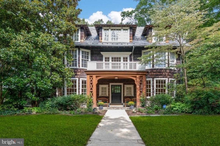 This Magnificent turn-of-the-century home embodies the tenets of the Arts & Crafts movement while also incorporating all the conveniences of modern life. Perfectly situated on the end of a cul-de-sac in Roland Park, location is verdant and quiet yet literal steps away from stores and schools. This optimal location in Roland Park is available once in a generation - first time on the open market in 30+ years! Spacious, light-filled rooms with high ceilings and triple bay windows flow one to the other through broad doorways. Enter through extra-wide double Dutch doors to a beautiful beamed front hall that is the house's heart.  Adjacent large living/family room has a huge fireplace, built in bookshelves, and French doors leading to a covered porch ideal for dining and social distancing with friends. Chef-designed kitchen combines vintage oak counter and original glass cabinets with modern built-in Corian Island and table.  The Dining room features unique mullioned plant window where your greenery will thrive in the natural light. Gorgeous original quarter-sawn oak floors span the rooms with no thresholds. Powder room and front hall closet ingeniously tucked under grand stairwell. A third extra wide Dutch door leads to a back deck for grilling and cocktails overlooking gardens. No dead or wasted space in this airy first floor! Original architectural detailed maintained throughout including a hand-painted scenic wallpaper panel from a series by famed painter Jean Zuber (The rest of this collection is in the Cooper-Hewitt). Second floor features large master suite with fireplace, dressing room with four large built-in closets and en-suite bathroom with linen closet. Oversized windows let in green-tinged light from surrounding trees that offer privacy and keep things cool.  A comfy den/library is conveniently located next to the master bedroom.  The Second beautiful bedroom also has triple bay windows while third room is cozy with unique built-ins and old fashioned sleeping porch as play/study area. Bedrooms share linen closet and full bath. Third floor is spacious and charming and offers two large eaved bedroom rooms PLUS two large studio/offices with built-in bookshelves optimal for work/study at home (paramount in pandemic times).   The third floor also has a large bathroom with vintage claw-foot tub and farm sink and two unfinished rooms ideal for storage. The lower level of this home features a huge, finished family room/recreation area with multiple closets for toys and gear.  The rec-room is carpeted and dry-walled with recessed lighting and finished ceilings. Cool in the summer, warm in the winter, this flowing space is a haven.  The lower level also offers a Work room, wine cellar, full bathroom, and laundry room. The rear doors open to a basketball court and a two-car garage. The house is situated on just over a half of an acre of well-groomed gardens, a virtual bird sanctuary. Visit with neighbors in this congenial neck of the woods and explore the charming historic footpaths of Roland Park, just steps from your door.  The side garden below the porch is home to beds of shade perennials. The Upper back yard is terraced ? Perfect for a fire pit or al fresco dining. Wrought iron gate and stone steps lead to a secret lower level. The garden has been built on a foundation laid by renowned gardener, Kurt Bluemel.  Featured in Baltimore Magazine, the unique plantings have been lovingly tended. But plot once held a swing set, and could be re-configured.  The house is not bound by any neighborhood covenants and the yard is absolutely private. On right side of house is a driveway - rare in Roland Park! Owners have kept a centuries old Beech tree that currently blocks access to two-car garage but the potential is there. Previous owners completely refurbished the house, blowing insulation into the walls, updating electrical, storming all the windows, and more.   Open Wednesday September 23rd  1-3pm