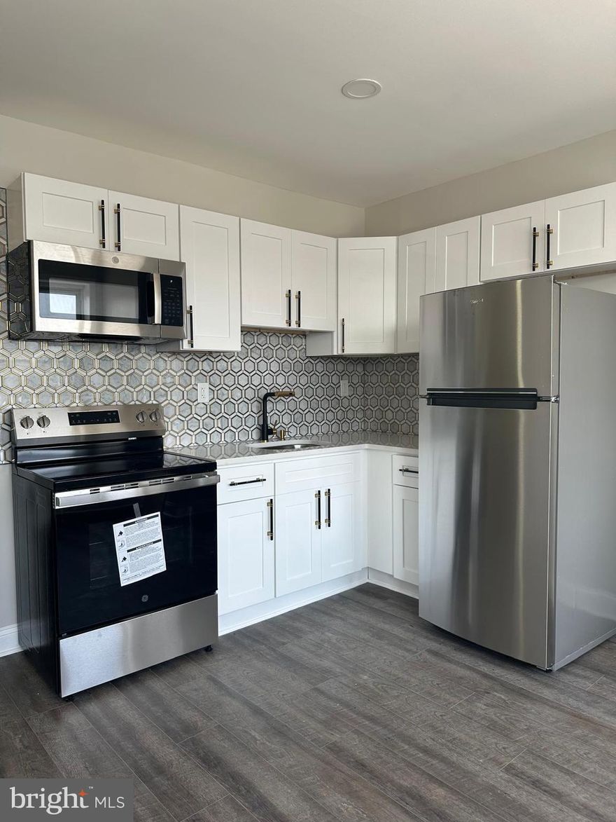 Beautifully renovated duplex! The first-floor apartment offers 1  bedroom, and the second-floor unit features 2 bedrooms. Both units have been completely renewed with modern finishes, new appliances, and efficient split-unit heating and cooling systems for year-round comfort.