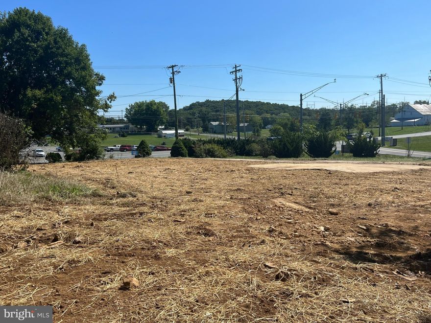 4159 Williamsport Pike, Martinsburg, WV 25404
Prime Corner Lot | 2.86 Acres | High-Traffic Commercial Site
Property Overview
Golden opportunity at a high-visibility, high-traffic intersection in the rapidly expanding Martinsburg market.
Located at the corner of Williamsport Pike (Route 11) and Bedington Road—commonly known as Bedington Crossroads—this 2.86-acre commercial parcel offers outstanding development potential.

The previous residential structure and outbuildings have been demolished and cleared, leaving a clean, shovel-ready site. This property is ideally positioned for a wide range of commercial uses and is one of the last available corner lots in this fast-growing corridor.

Property Highlights
Lot Size: 2.86 Acres

Zoning: Commercial (verify with county)

Frontage: Dual frontage on Williamsport Pike (Rt. 11) & Bedington Rd.

Traffic Counts: High daily visibility and vehicle exposure

Topography: Level and build-ready

Utilities: Available nearby (buyer to verify)

Structures: Cleared site – old house and outbuildings removed

Ideal Uses
Retail / Shopping Center

Gas Station / Convenience Store

Fast-Food or Quick-Service Restaurant

Self-Storage Facility

Medical / Office Complex

Multi-Family or Mixed-Use Development

Investment Highlights
Prime corner location with heavy commuter and local traffic

Explosive population and retail growth in the surrounding Martinsburg area

Excellent ingress/egress and site accessibility

One of the few remaining undeveloped commercial corners in the corridor

Flexible site plan potential – suitable for single or multi-tenant projects

Location
Strategically positioned near major transportation routes and surrounded by new residential developments, retail centers, and service businesses.
This site represents a rare opportunity for developers and investors seeking visibility, access, and long-term upside in one of Berkeley County’s fastest-growing areas.