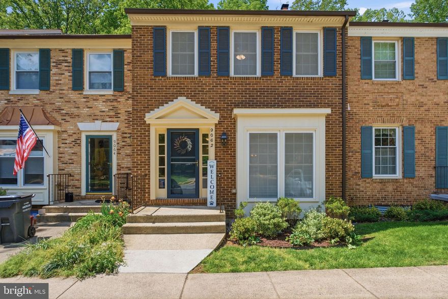 Nestled in the Kings Grant community of Glenwood Manor, this 3-bedroom, 4-bath (2 full/2 half) brick townhouse offers three finished levels in a desirable setting backing to woods for added privacy. This move-in ready home features fresh paint and brand-new carpet throughout. The main level entrance steps down to a natural light-filled living room with a bay window and 10ft ceiling. The kitchen is highlighted by freshly painted cabinets, updated appliances (stove (2026), microwave (2026), newer refrigerator (2024)), and a breakfast nook overlooking the wooded backdrop. The separate dining room opens to a large deck providing easy access for outdoor dining or relaxing evenings. Upstairs, the primary suite includes an en-suite bathroom with dual sinks and a large walk-in shower. Two additional bedrooms share a renovated hall bathroom (2026). The walkout basement offers a sizable recreation room with a wood burning fireplace, a half bathroom, and a utility room with laundry, basin sink, and ample shelving for storage.  Additional updates include water heater (2024), and roof (2017). Walking distance to Huntsman Lake and shopping/dining at Huntsman Square shopping center.  Easy access to Fairfax County Parkway, 395/495, VRE, metro, and metrobus routes. Turnkey and conveniently located, you don't want to miss out on this home!