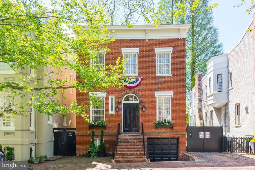 Meticulously rebuilt 4BR/4.5BA detached home, formally a boy's school in the 1840's & 2008 DC Design house. This beautiful residence features exquisite details, soaring ceilings, and is perfect for entertaining. The main level features a gourmet Kitchen w/top of the line appliances, Living Room with fireplace, Formal Dining Room, Family Room with access to a screened-in porch, and renovated Full Bath. Upstairs has an exceptional Master Suite,  2 additional Bedrooms, and luxurious full bathroom. The Lower Level features a Media Room, Full Bath, and Home Office/Wine Room or 4th Bedroom. Outside has a spacious Patio and professionally landscaped Garden w/ outdoor lighting. Garage Parking is included.