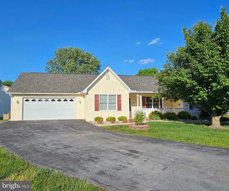 Lovely one-level rancher in sought-after community of Spring Mills close to shopping & I-81 with approx. 1460 sq. ft. of space.  This home sits at the end of a quiet cul-de-sac and has 3 nice-sized bedrooms, 2 full baths, a living room with cathedral ceiling, a dining room area, a galley style kitchen with a pantry, an adjoining breakfast area with bay windows, a master bedroom with a walk-in closet and its own private bath, plus two additional bedrooms on the other side with a shared full bath.  The laundry room leads out into the over-sized garage with additional storage room, a storage & utility closet, a pull-down to the attic, a workbench, plus a laundry tub for washing up when working out in the yard.  The rear deck is made of composite materials for easier maintenance.  Home was recently restored after fire in crawl space with new heat pump, laminate plank flooring throughout the main living areas and new carpet in the bedrooms, all freshly painted, and hall bath was given a new vanity & toilet.  Plus, a brand-new dishwasher & washing machine were added!  All other appliances are as-is!  To help with the sale of the home, the owner decided to splurge and put on a new architectural roof before selling...barely 2 months old!  Great location and priced to sell!  HOA fee is reduced for 2024 to reset annual budget to a calendar year.