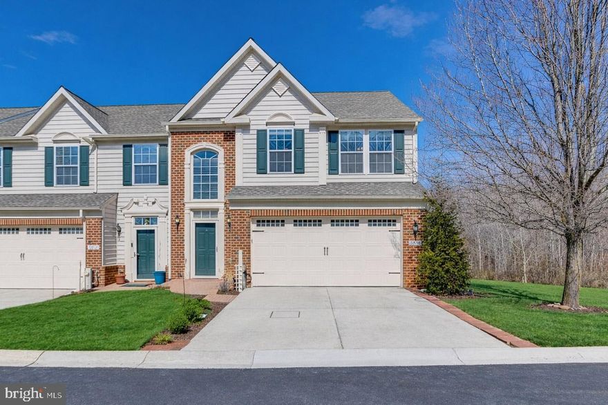 Welcome to this spacious and light-filled end-unit villa located in a vibrant 55+ active adult community offering exceptional amenities, including a pool, tennis courts, walking paths, clubhouse, and more.Set in a serene, park-like setting with mature trees and expansive green space, this home offers both privacy and natural beauty. Enjoy peaceful mornings on the deck overlooking open space or take in the scenic views from the kitchen’s large bay windows.Inside, the open floor plan showcases soaring ceilings and a welcoming two-story foyer. The expansive kitchen features a center island and breakfast nook, seamlessly flowing into the dining and living areas, where a stunning stone gas fireplace creates a warm and inviting atmosphere — perfect for entertaining or relaxing evenings at home.The spacious main-level primary suite is beautifully appointed with a large closet and spa-like bath, offering comfort and convenience all on one level.Upstairs, you'll find two generously sized bedrooms, a full bathroom, a large loft, and a charming bonus room — ideal for hobbies, reading, or a dedicated workspace.The fully finished lower level is designed for entertaining and versatility, complete with a theater-style setup, bar area, full bathroom, and private office space.This home also offers peace of mind with major updates already completed: a new roof (2024), new water heater (May 2025), new refrigerator (May 2025), brand new stove, and new washer and dryer (June 2025). Simply move in and enjoy!Additional features include a 2-car garage, driveway parking, and available street parking. Combining comfort, thoughtful updates, and a low-maintenance lifestyle in an amenity-rich community, this home truly has it all.