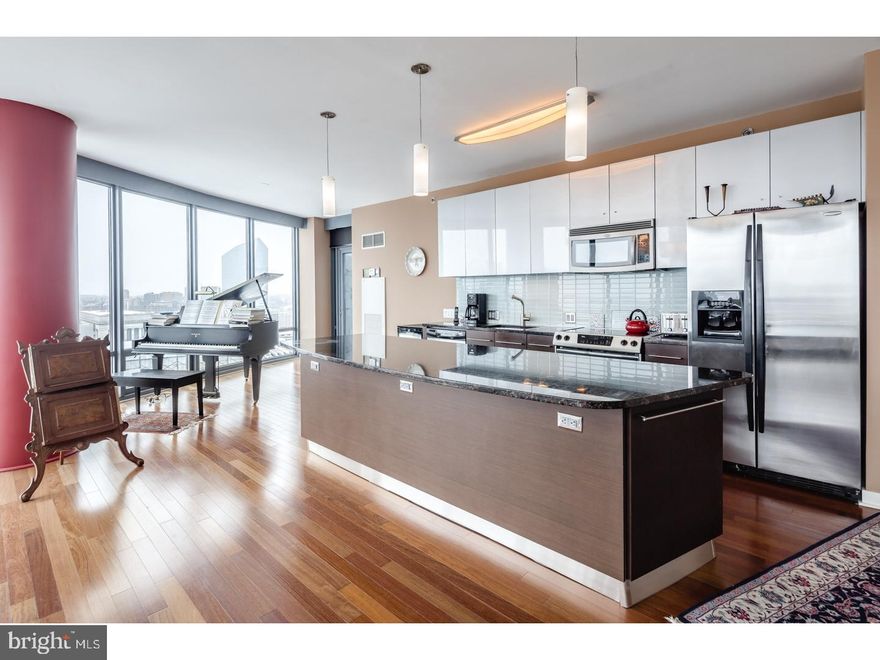 Extremely RARE offering - Live every day like a VIP in one of the most exciting buildings in Philadelphia, The Murano! This unit features endless North views, granite counter-tops, stainless steel appliances and darker wood flooring, PARKING and STORAGE. The building offers 24 hour concierge service, 24 hour heated lap pool, and a state-of-the-art gym at your disposal. Parking & storage is included in the price!! Amazing views!  Could potentially have 2 parking spots