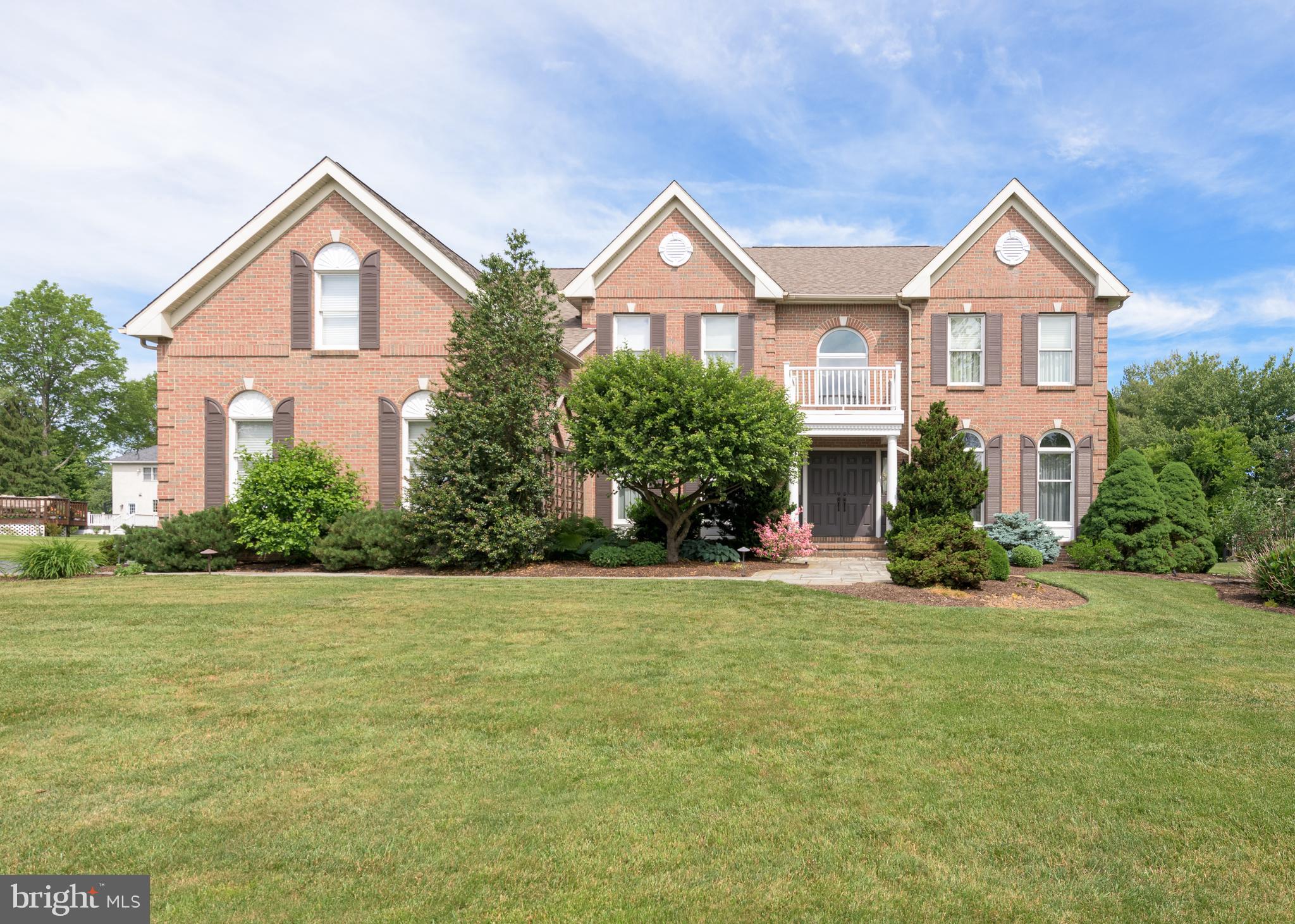 Tastefully updated and impeccably maintained colonial home set on picturesque lot in popular "The Greens of Waynesborough" neighborhood. Spacious rooms and an exceptional floor plan blend perfectly for entertaining and everyday living. The first floor features a welcoming two-story entrance foyer with split staircase, formal living room and formal dining room. The spacious gourmet kitchen is breathtaking and includes a seated island, custom alder cabinetry, granite countertops, marble backsplash, Wolf cooktop/microwave/oven, Bosch dishwasher, recessed lighting, built-in desk and rear staircase. Adjoining the kitchen is a dining area with skylight and outside access to an impressive brick patio, with beautifully landscaped grounds. The family room is stunning and features a vaulted ceiling with skylights, ceiling fan and a raised hearth stone fireplace. Off of the family room is a private study with French doors and built-in bookshelves. Completing the first floor is a hall powder room with pedestal sink, laundry room with outside access to patio and an oversized three-car garage with storage and inside access. Upstairs you will find the primary suite with a spacious sitting room, bedroom with tray ceiling, ceiling fan and a fantastic walk-in closet with custom built-ins. The primary bathroom features a vaulted ceiling with skylight, custom cabinetry, granite countertops, soaking tub, stall shower and linen closet. The second bedroom (princess suite) includes a ceiling fan and an en suite bathroom. Completing the second floor are two additional bedrooms with a "Jack and Jill" bathroom. The finished walk-out lower level is perfect for entertaining and includes recessed lighting, entertainment/pool table area, bar, powder room, fireplace and storage areas. There have been numerous renovations, replacements and upgrades made by the original owners. This home is truly move-in ready. Close proximity to transportation, shopping and dining. Outstanding Tredyffrin/Easttown School District. Schedule an appointment to see today!