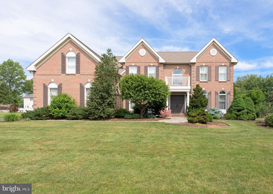 Tastefully updated and impeccably maintained colonial home set on picturesque lot in popular "The Greens of Waynesborough" neighborhood.  Spacious rooms and an exceptional floor plan blend perfectly for entertaining and everyday living.  The first floor features a welcoming two-story entrance foyer with split staircase, formal living room and formal dining room.  The spacious gourmet kitchen is breathtaking and includes a seated island, custom alder cabinetry, granite countertops, marble backsplash, Wolf cooktop/microwave/oven, Bosch dishwasher, recessed lighting, built-in desk and rear staircase.  Adjoining the kitchen is a dining area with skylight and outside access to an impressive brick patio, with beautifully landscaped grounds.  The family room is stunning and features a vaulted ceiling with skylights, ceiling fan and a raised hearth stone fireplace.  Off of the family room is a private study with French doors and built-in bookshelves.  Completing the first floor is a hall powder room with pedestal sink, laundry room with outside access to patio and an oversized three-car garage with storage and inside access.  Upstairs you will find the primary suite with a spacious sitting room, bedroom with tray ceiling, ceiling fan and a fantastic walk-in closet with custom built-ins.  The primary bathroom features a vaulted ceiling with skylight, custom cabinetry, granite countertops, soaking tub, stall shower and linen closet.  The second bedroom (princess suite) includes a ceiling fan and an en suite bathroom.  Completing the second floor are two additional bedrooms with a "Jack and Jill" bathroom.  The finished walk-out lower level is perfect for entertaining and includes recessed lighting, entertainment/pool table area, bar, powder room, fireplace and storage areas.  There have been numerous renovations, replacements and upgrades made by the original owners.  This home is truly move-in ready.  Close proximity to transportation, shopping and dining.  Outstanding Tredyffrin/Easttown School District.  Schedule an appointment to see today!