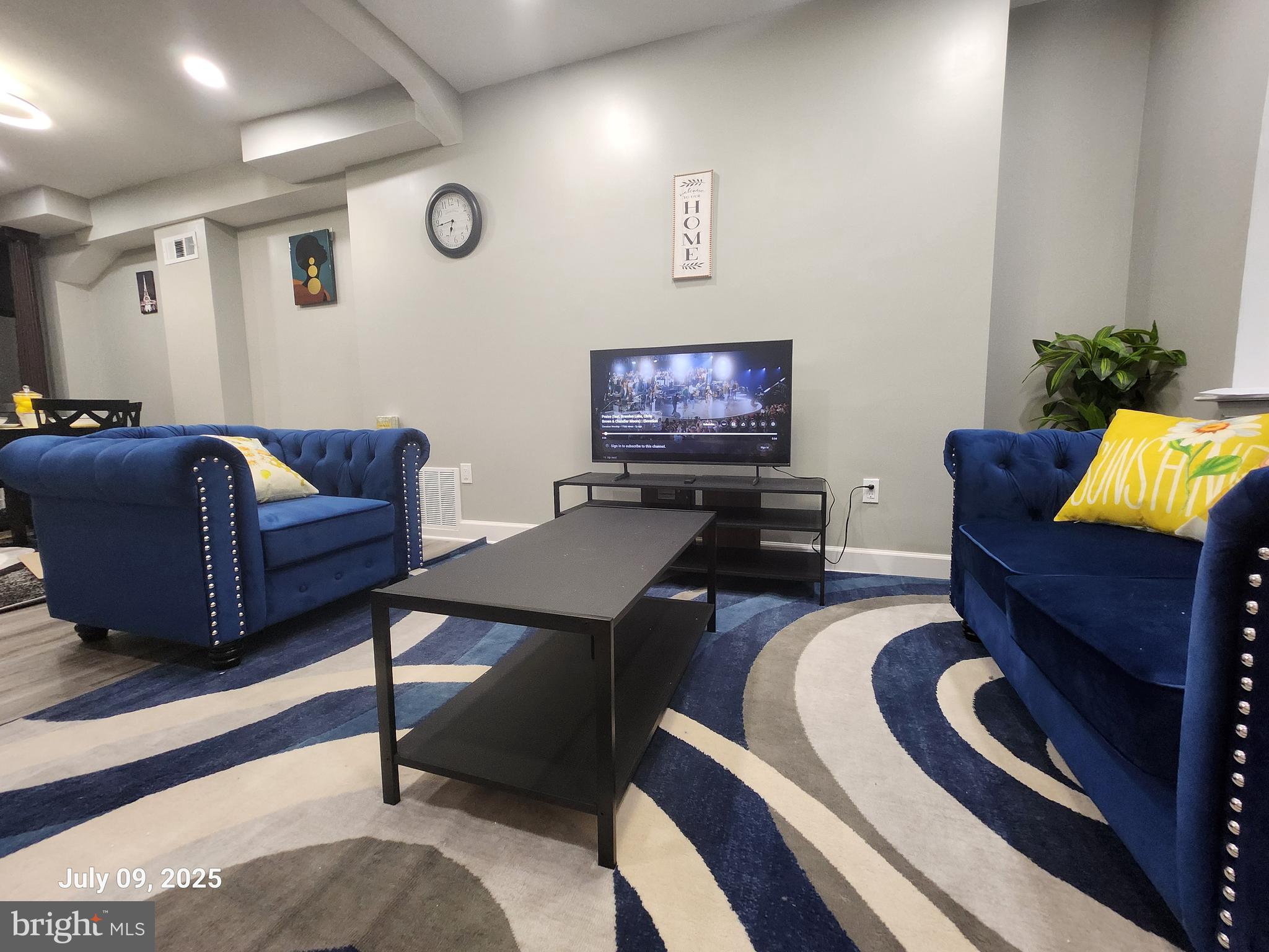 Beautifully renovated top-to-bottom, FURNISHED three-bedroom, three-and-a-half-bathroom Townhome at the heart of East Baltimore's Johns Hopkins Staff & student community, just waiting for you to make a home. Step into an open-floor vinyl main level with stunning living room, a large dining area and newly installed kitchen featuring beautifully crafted ceilings, custom kitchen backsplash and stainless appliances topped by large dark cabinets. A half-bath and designated laundry area completes this floor convenience with plenty of natural light. Upper level has 2 ensuite bedrooms, each with full baths. Lower level offers a large recreational area, a 3rd bedroom and full bath or make the entire lower level your private haven. A generous backyard for your grill and outdoor needs. Off street parking on the front and more parking on E. Madison. A prime location close to Johns Hopkins Hospital, Johns Hopkins Bloomberg School of Public Health, Johns Hopkins Medical Campus, University of Maryland Baltimore and University of Baltimore. Just steps away from the North East Market, restaurants, groceries and everything else. Convenient to several bus routes, Metro, Downtown and major highways. Rent includes all utilities. All you need to do is just bring your bags!!!