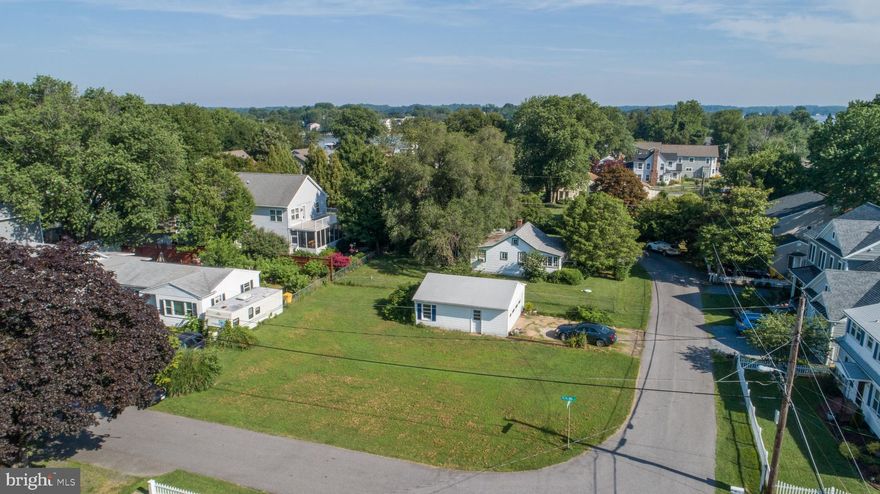 Lot with current garage.  Across the street from the water.  Shoreham Beach community.   Best beaches in Edgewater!