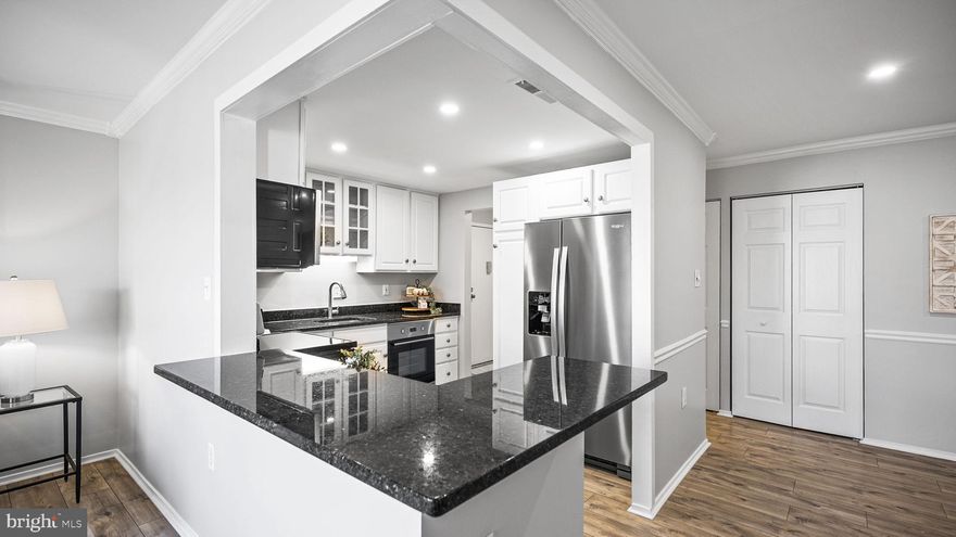 FHA approved & Low condo fee $338.07 per month.  This is the one you were looking for: 3 bedrooms, 2 full baths, 1,212 Square Feet condo, open-concept kitchen, spacious dining, and family room with a cozy fireplace to enjoy during the colder months, and a balcony overlooking the green and nicely landscaped courtyard . This home is flooded with Natural light thanks to the many windows throughout and the balcony's large sliding glass doors. The condo has been recently renovated: fleshly painted throughout, new kitchen granite countertops, new stainless appliances, new recess lighting, new lighting fixtures, new closet doors, new french doors to the 3rd bedroom, etc. Both bathrooms have been updated with new vanities, new mirrors, new LVP flooring and new shower doors in the master bathroom. Take advantage of the many amenities available to you: outdoor pool, tot lots, baseball field, lakes, community center, etc.  15 minutes to Shady Grove Metro, 10 minutes to 270 Hwy, walking distance to CVS & to the Montgomery Village Center, less than 5 minutes from the new grocery Store Lidl and the new retail development totaling approximately 25,000 sq feet near the intersection of Montgomery Village Avenue and Whetstone Drive.