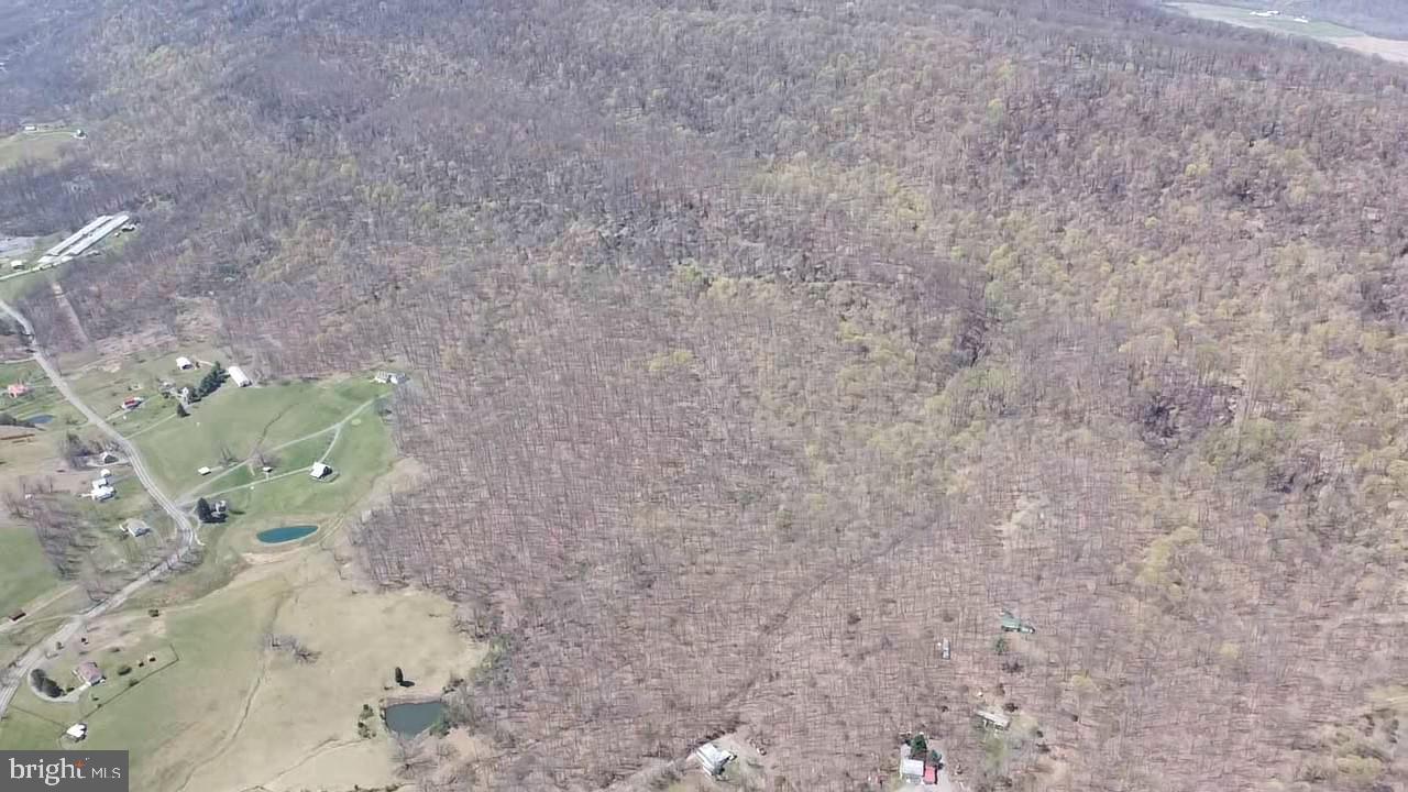 Opportunities like this knock just once.... and don't come back no more! This is YOUR chance to own your own 20+ acre slice of Almost Heaven WV!! Nestled in the heart of rolling hills on Knobley Road, this location allows you the feeling of total seclusion but offers the convenience of being minutes away from town. Whether you're traveling to Short Gap, Keyser, Cumberland, Fort Ashby....you are in a completely middle area for travel! The property does feature an older mobile home.