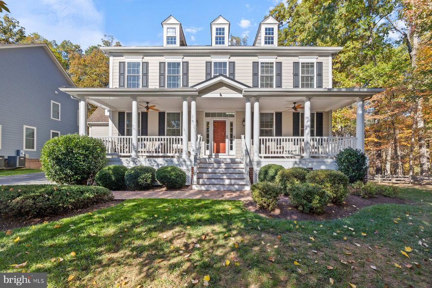 Welcome to this stunning craftsman-style colonial, built by NV Homes in 2015 and thoughtfully designed with every upgrade imaginable. Offering nearly 6,300 square feet of beautifully finished living space, this home perfectly blends timeless elegance with modern functionality. A charming front porch, extended driveway, and oversized two-car garage create an inviting first impression, while the private setting backing to trees provides a serene backdrop. Inside, a dramatic two-story foyer opens to an expansive, open-concept layout, flanked by a spacious private office/den and a formal living room. A striking dual central staircase anchors the home and adds architectural interest. The oversized formal dining room features custom niche built-ins and flows seamlessly into a butler’s pantry, leading to the gourmet chef’s kitchen. Here, you’ll find two-tone cabinetry, a large center island and a sun-filled morning room extension—perfect for casual dining and entertaining. The kitchen opens to a warm and inviting family room with a gas fireplace, while the screened-in porch with composite decking and a built-in heater offers year-round outdoor enjoyment. Upstairs, the home continues to impress with a thoughtfully designed layout. Two generously sized secondary bedrooms share a Jack-and-Jill bath, while a third bedroom features its own private en-suite. The luxurious primary bedroom is a true retreat, boasting three walk-in closets and a spa-inspired bathroom with dual vanities, an oversized shower with dual shower heads and a private water closet. A large bonus room over the garage provides additional flexible space— add additional privacy and entertaining space off your primary bedroom. The fully finished walkout lower level is built for entertaining, featuring a spacious recreation area with a wet bar, a bonus area for games or hobbies, a bedroom and a full bathroom—perfect for guests. Additional highlights include a well-organized mechanical room with custom shelving and ample storage. Step outside to a beautifully designed outdoor living space with a flagstone patio, built-in fire pit and a grassy side yard, along with extra storage beneath the deck. Every detail of this exceptional home has been carefully curated—offering luxury, comfort and versatility at every turn.